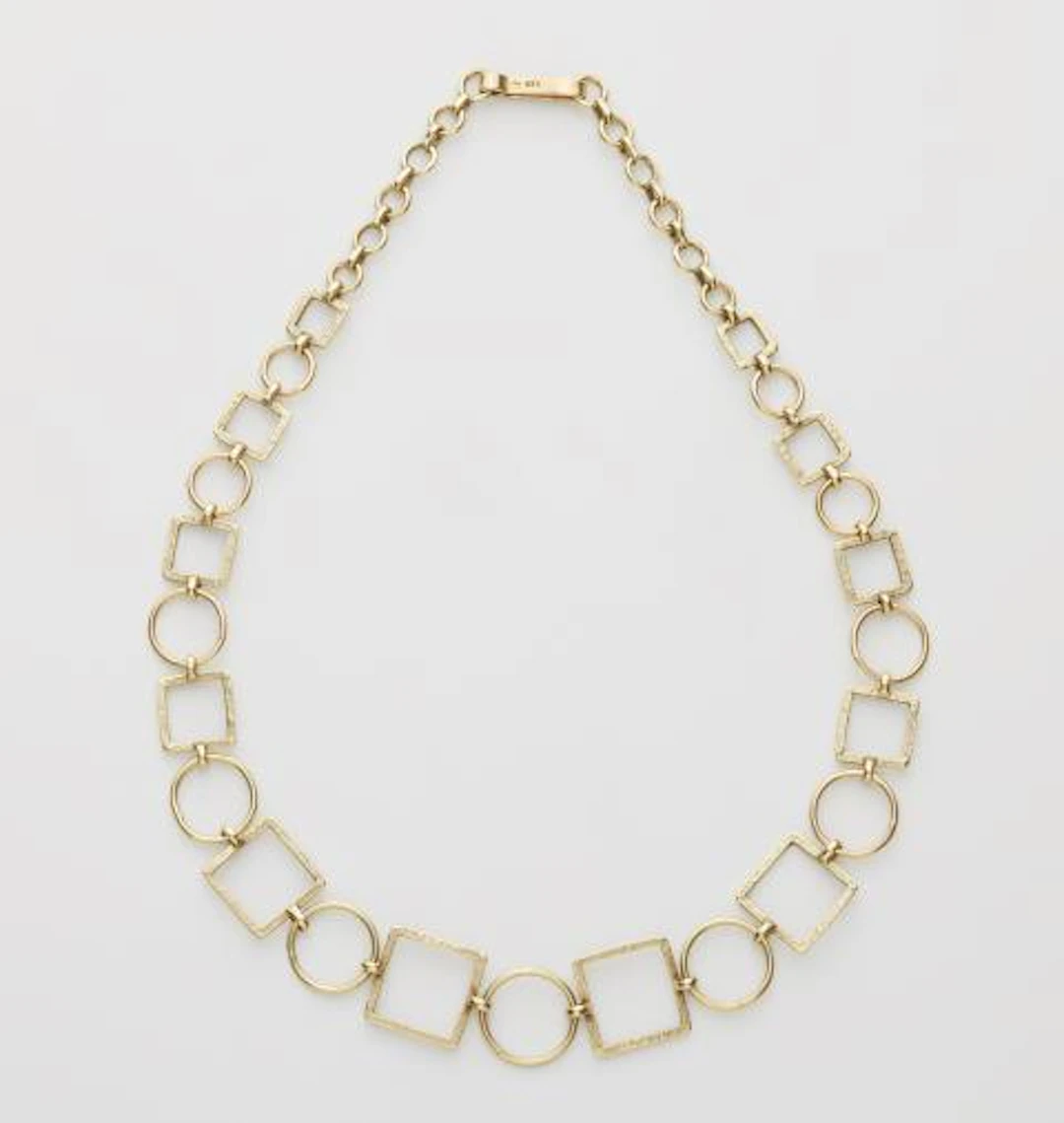 A German 14k yellow gold chain necklace.