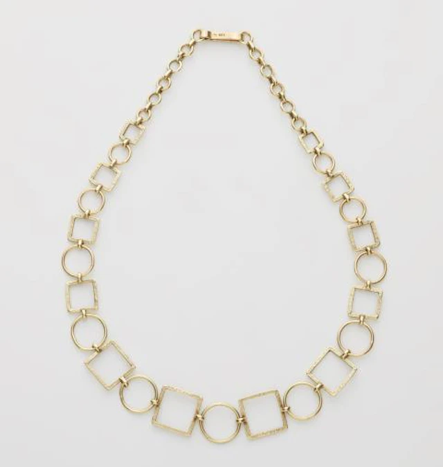 A German 14k yellow gold chain necklace.