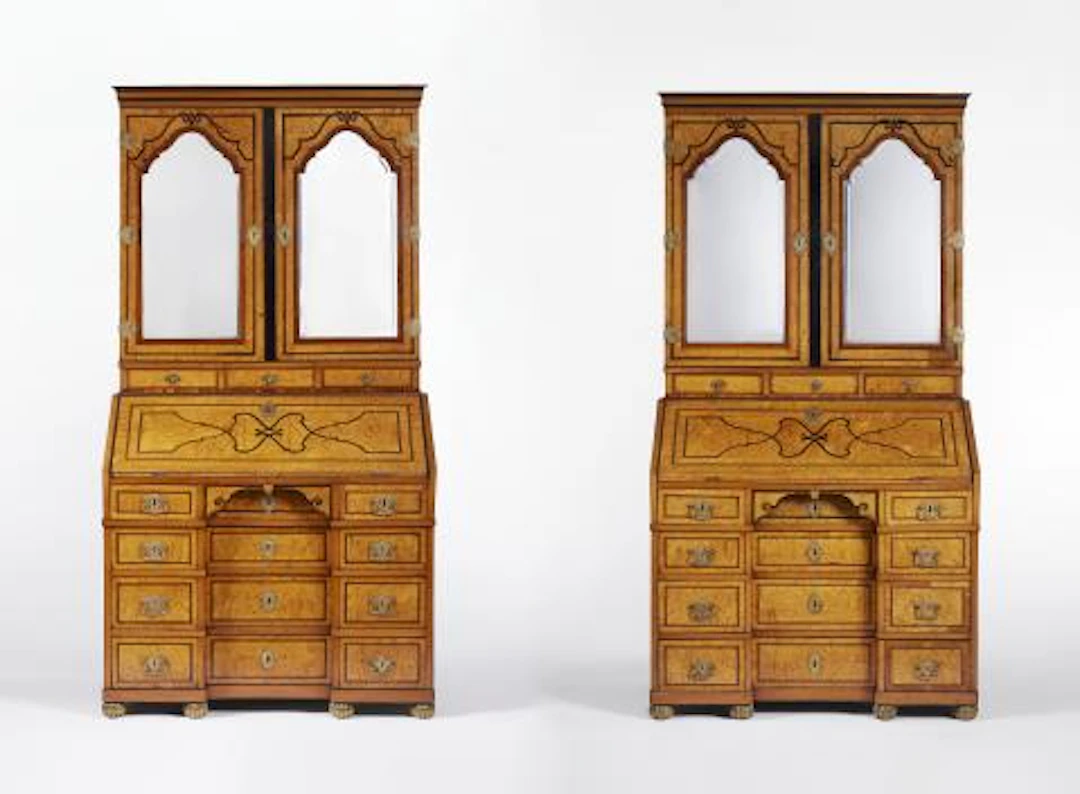 An exceptional pair of mirrored escritoires