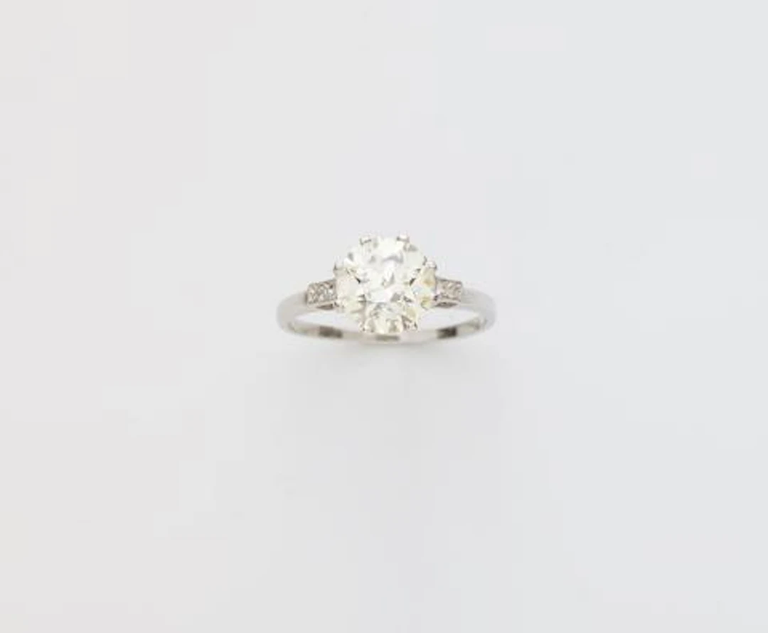 A platinum and transitional-cut diamondArt Déco solitaire ring.
