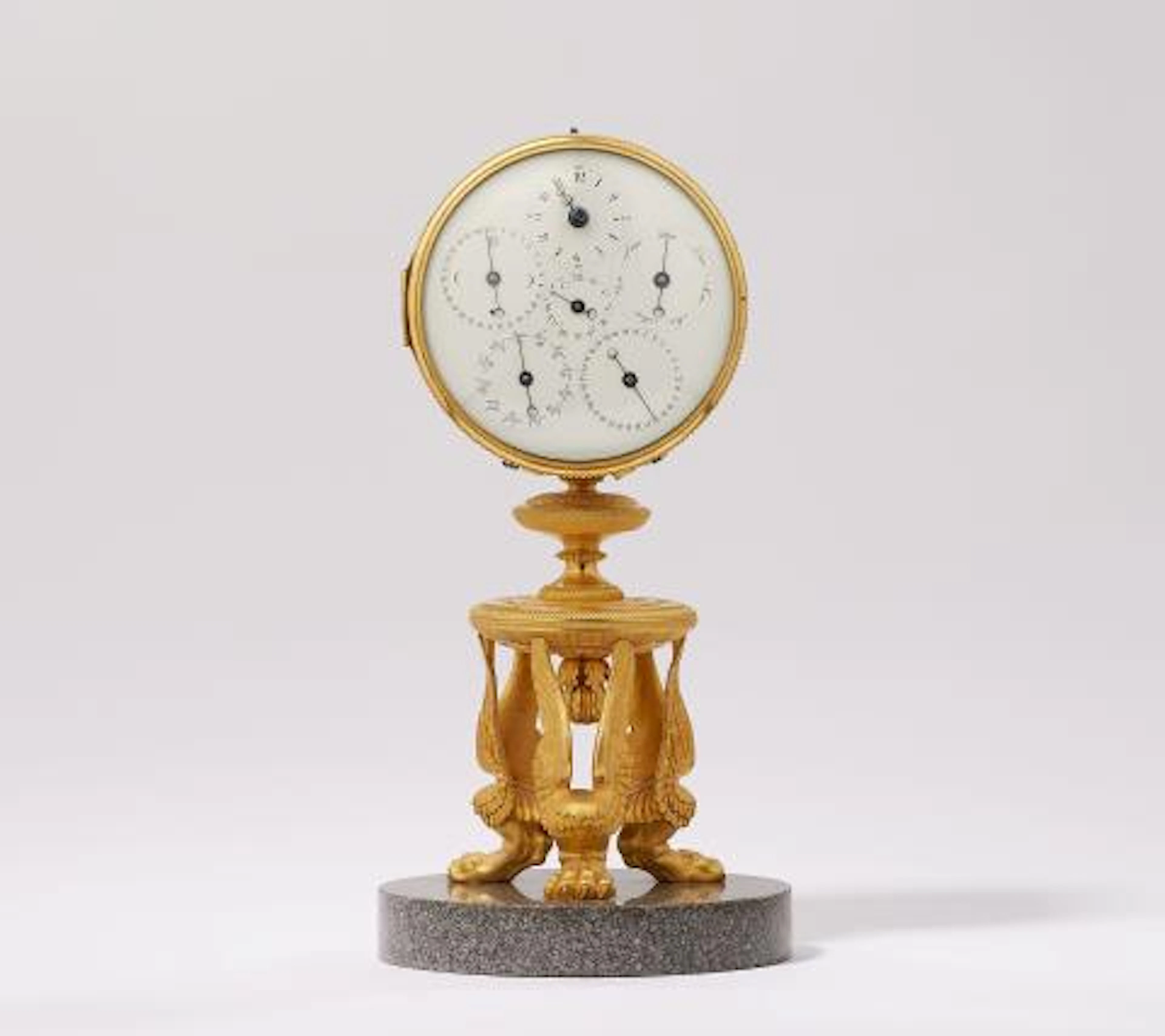 A rare table clock with perpetual calendar in the Empire style