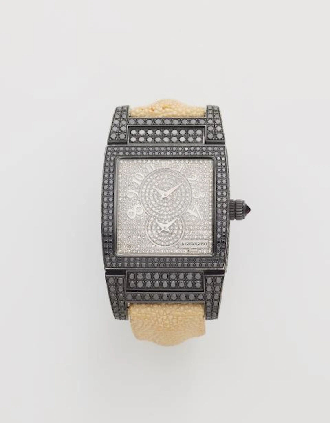 An 18k white gold PVD-coated and diamond De Grisogono wristwatch.