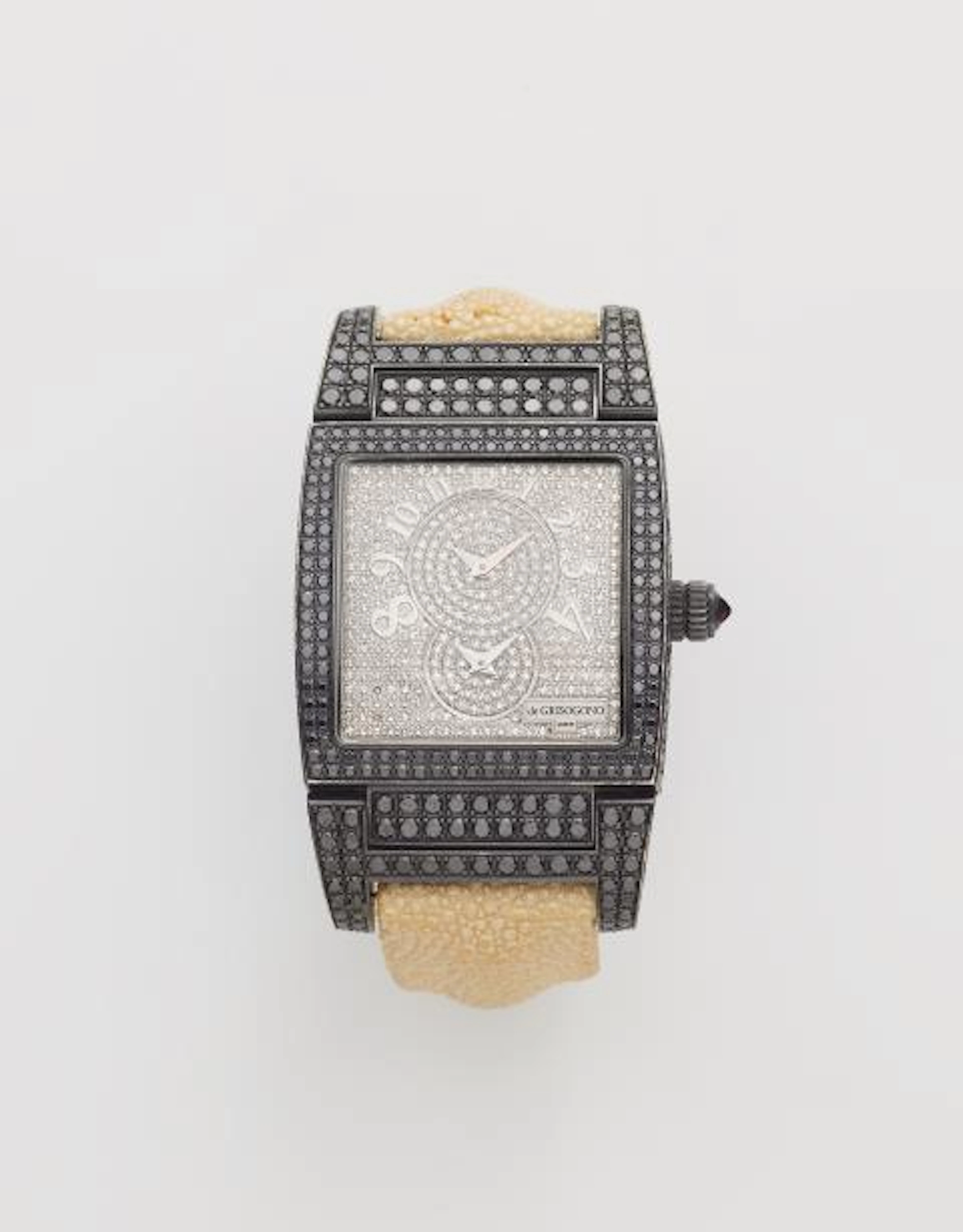 An 18k white gold PVD-coated and diamond De Grisogono wristwatch.