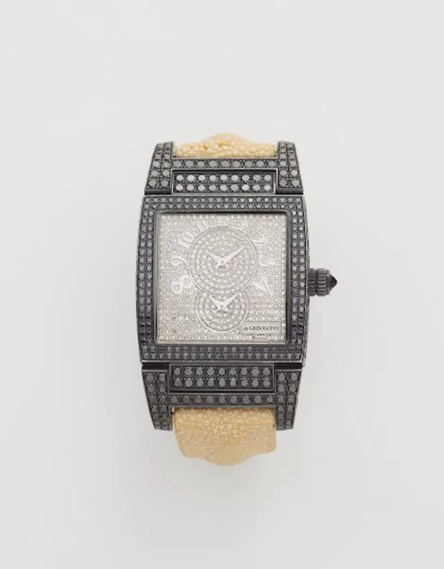 An 18k white gold PVD-coated and diamond De Grisogono wristwatch.