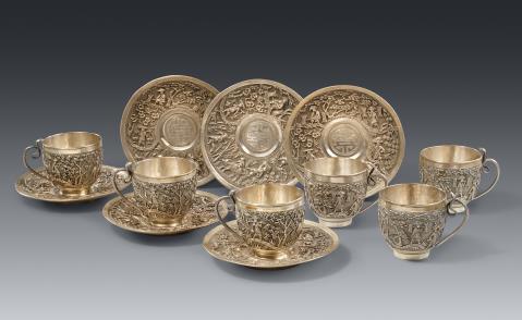 Six silver teacups and saucers. Vietnam. Around 1900