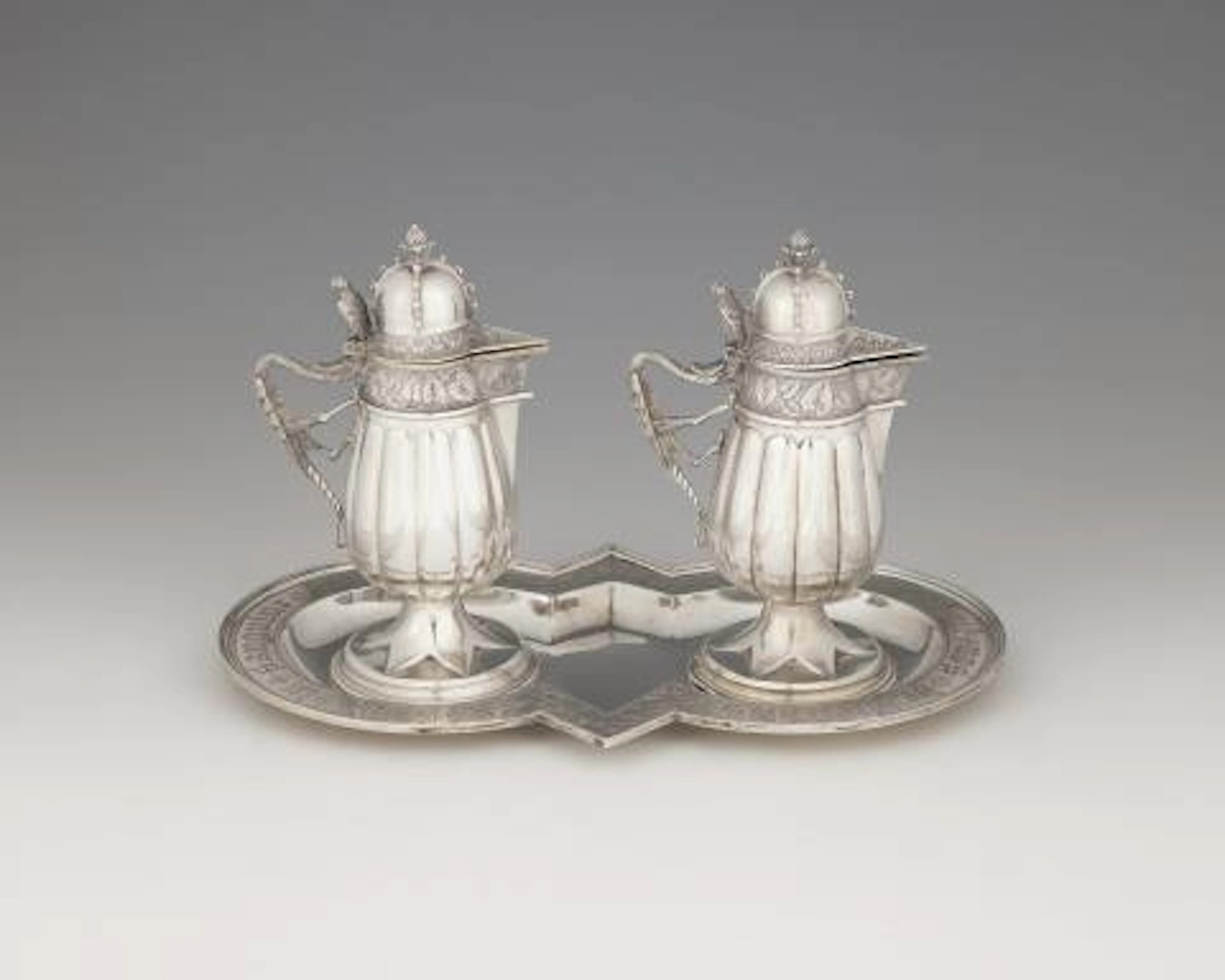 A Historicist silver communion garniture