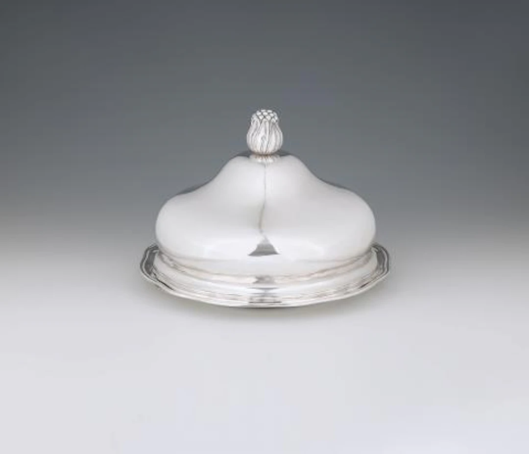 From the Dresden Court Silver Round dish with a warming cloche