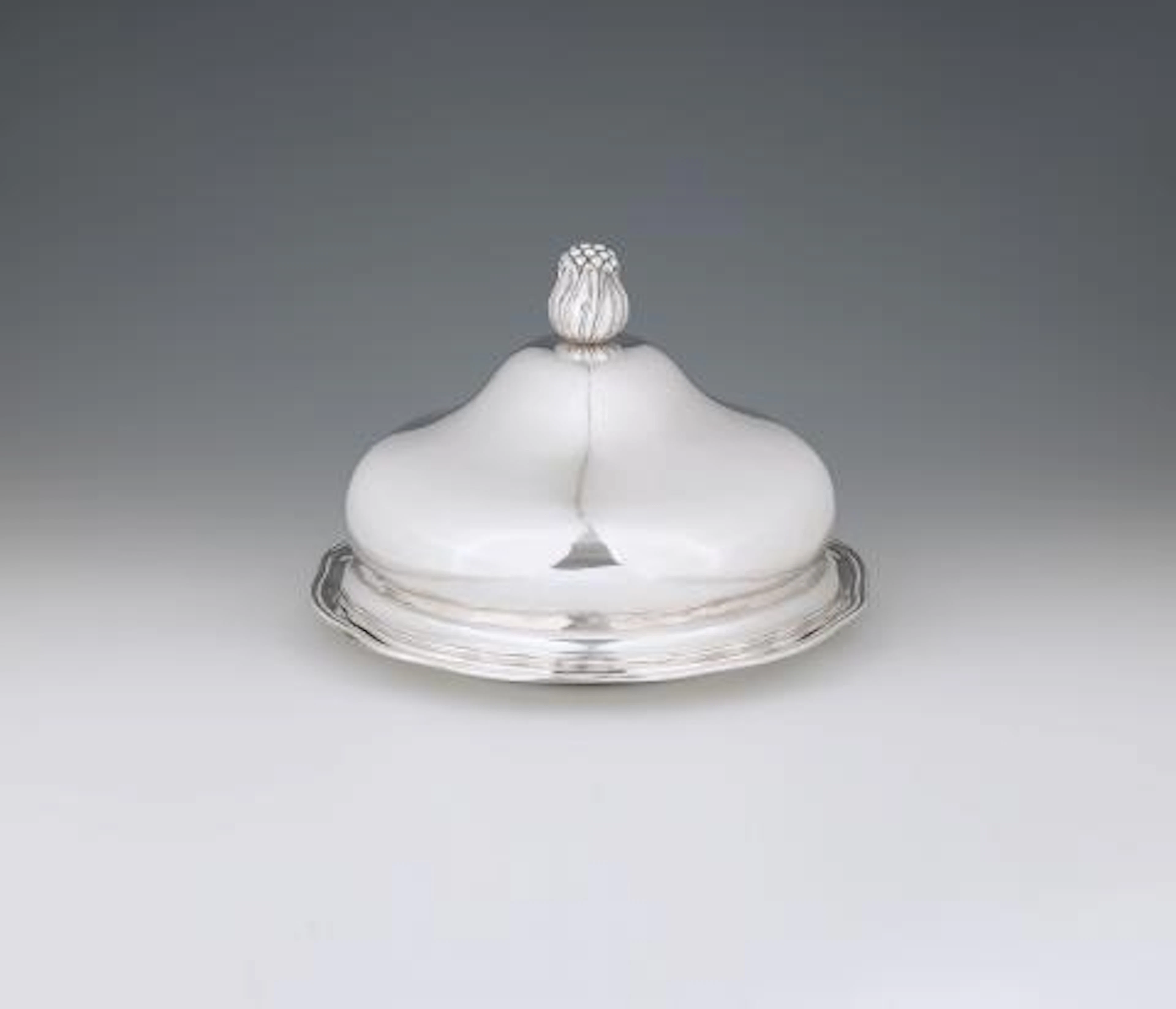 From the Dresden Court Silver Round dish with a warming cloche