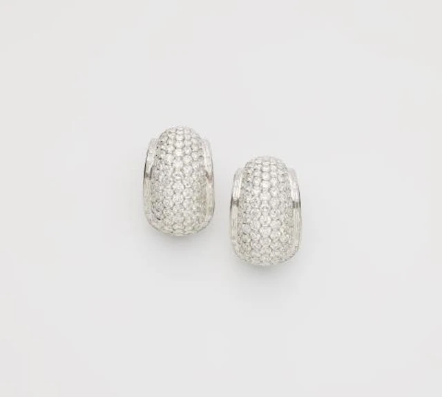 A pair of Italian 18k white gold and diamond cocktail creole clip earrings.