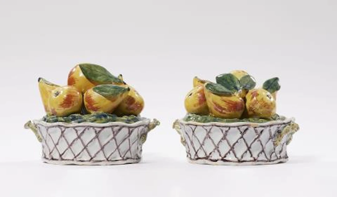 A pair of small Dutch Delft faience fruit basket tureens