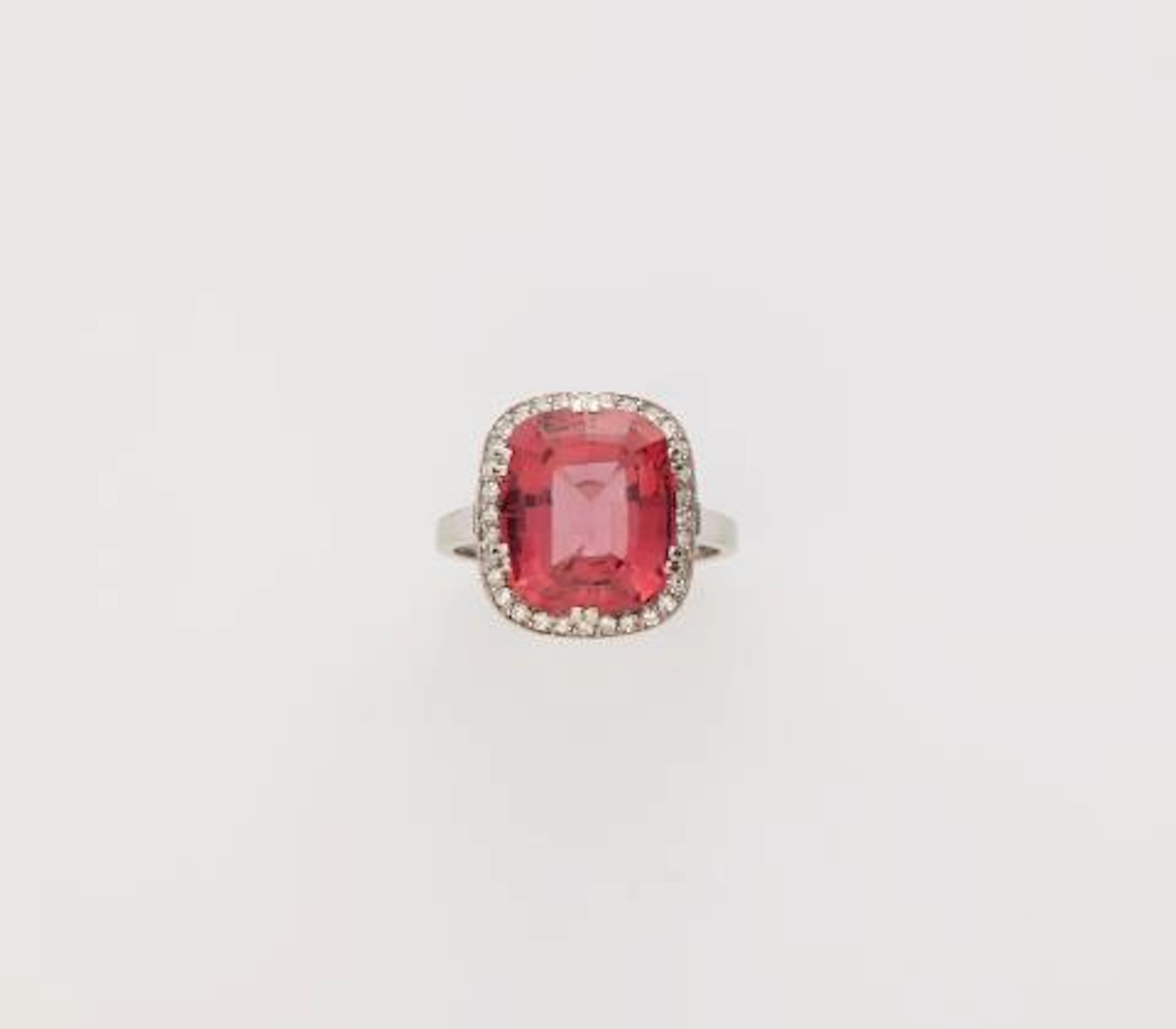 A Swedish 18k white gold diamond and pink tourmaline ring.