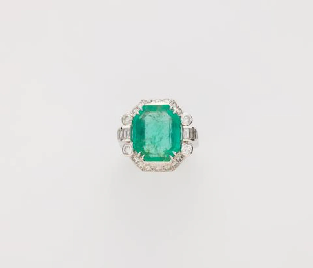 A platinum diamond and natural Colombian emerald ring.