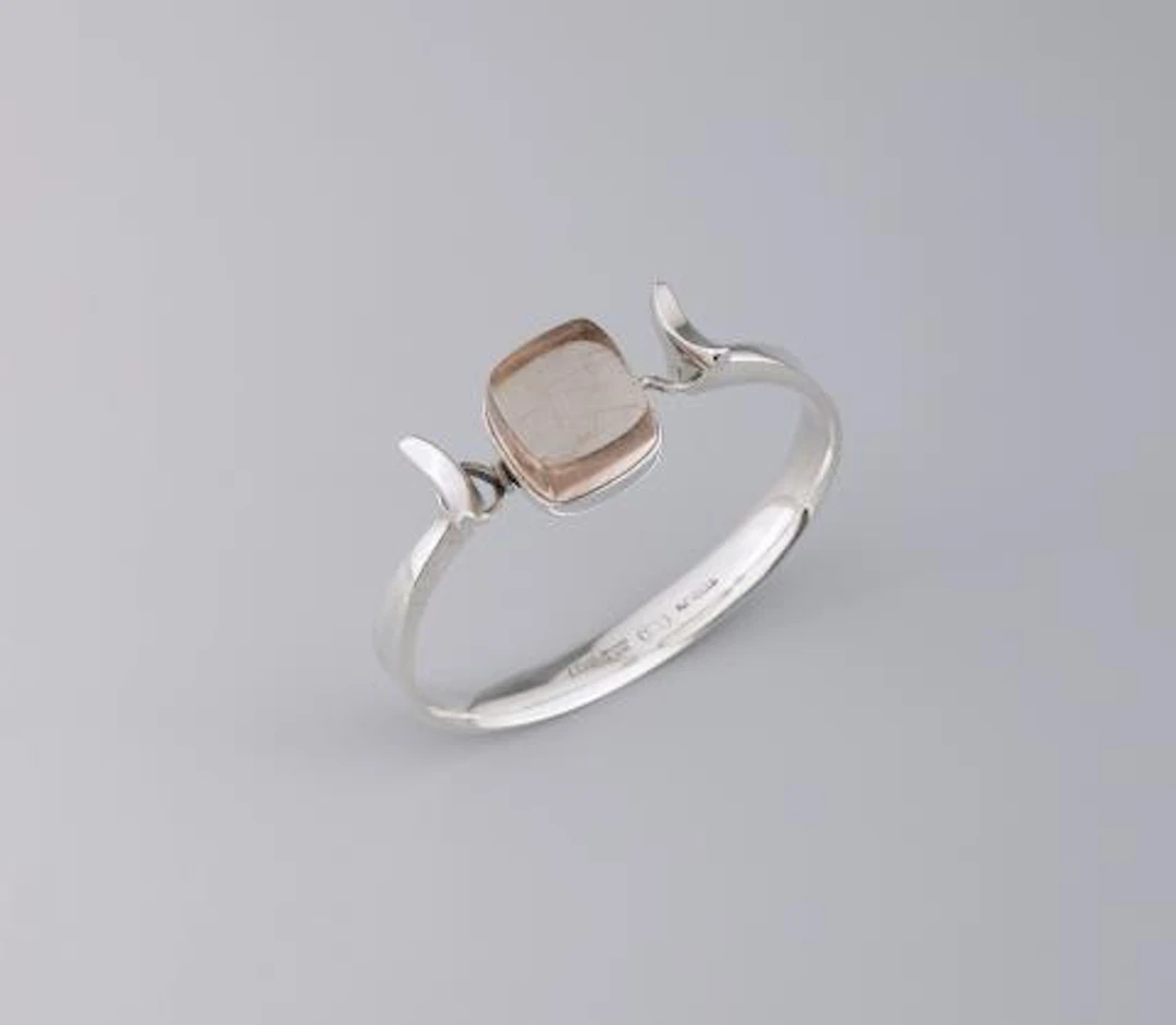 A Georg Jensen silver bangle, no. 207