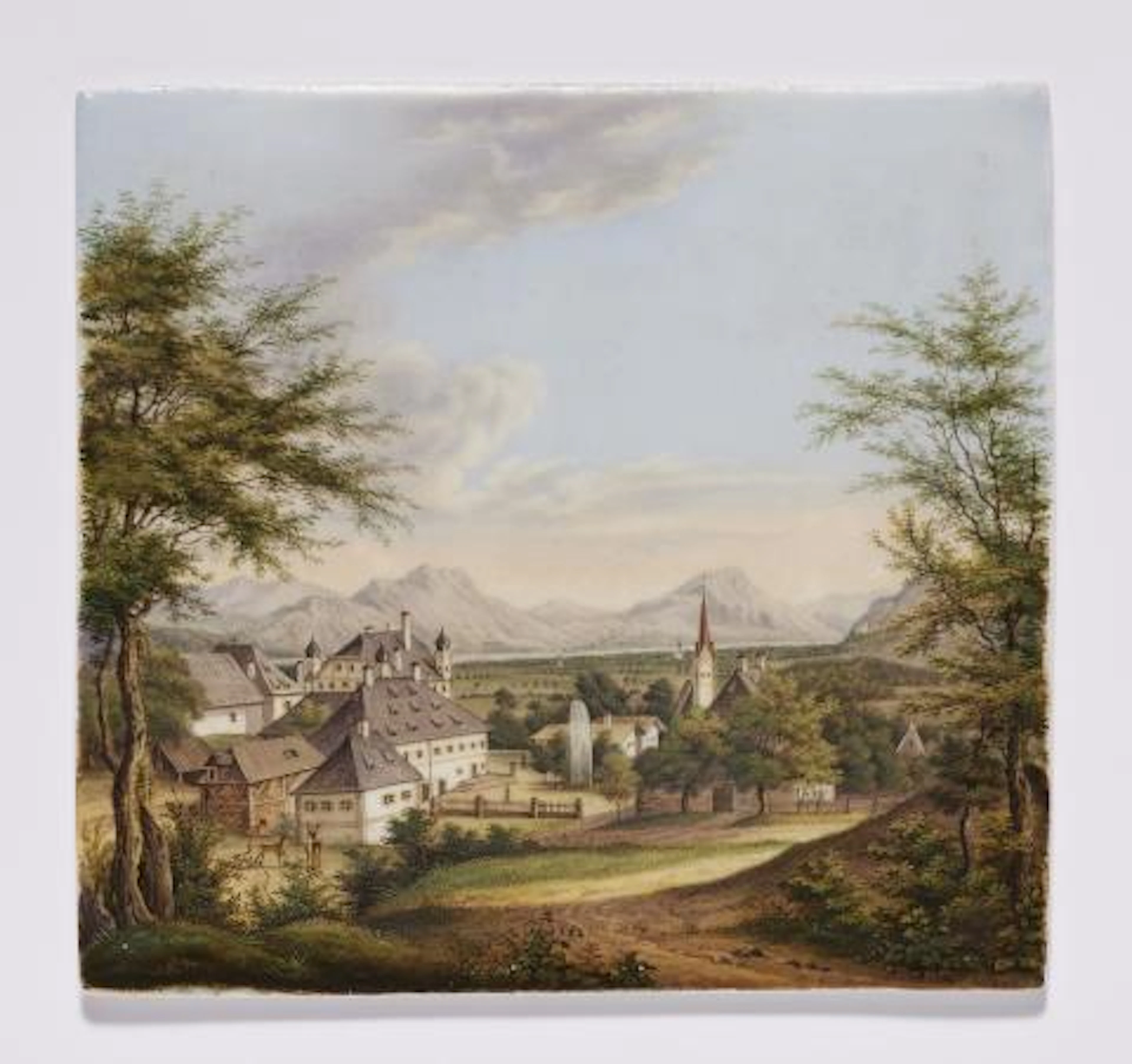A German porcelain plaque with a view of Brannenburg near Rosenheim