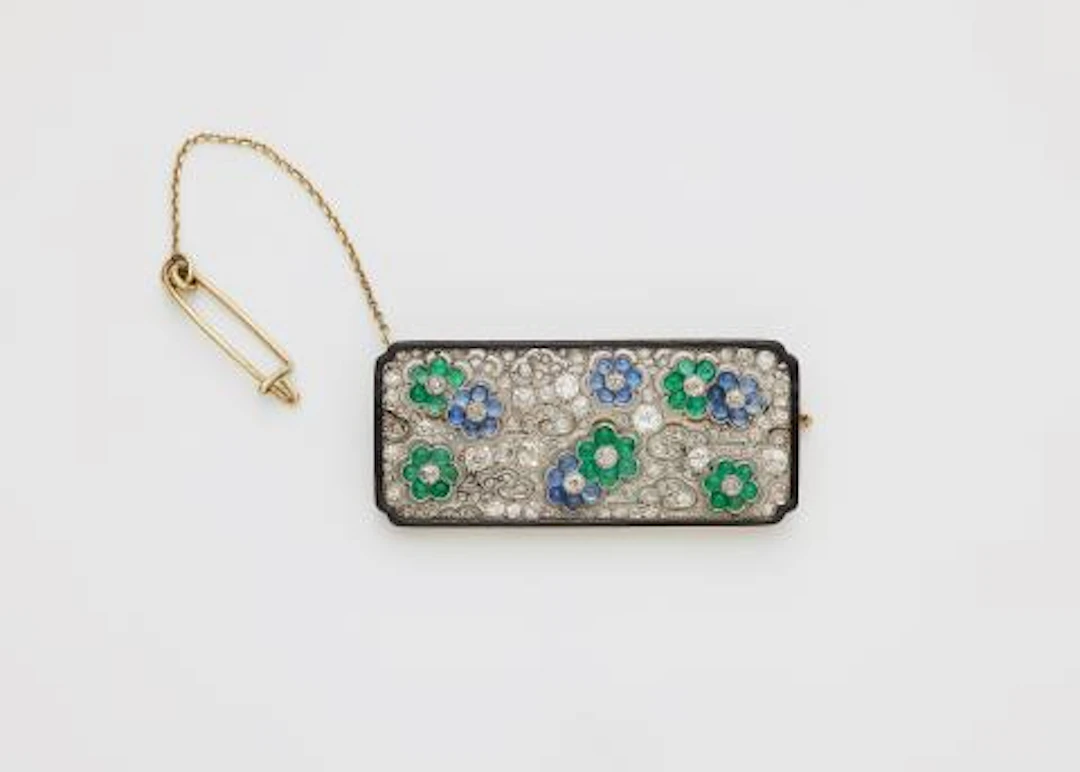 An Art Déco 14k gold platinum diamond sapphire and emerald Japanese
