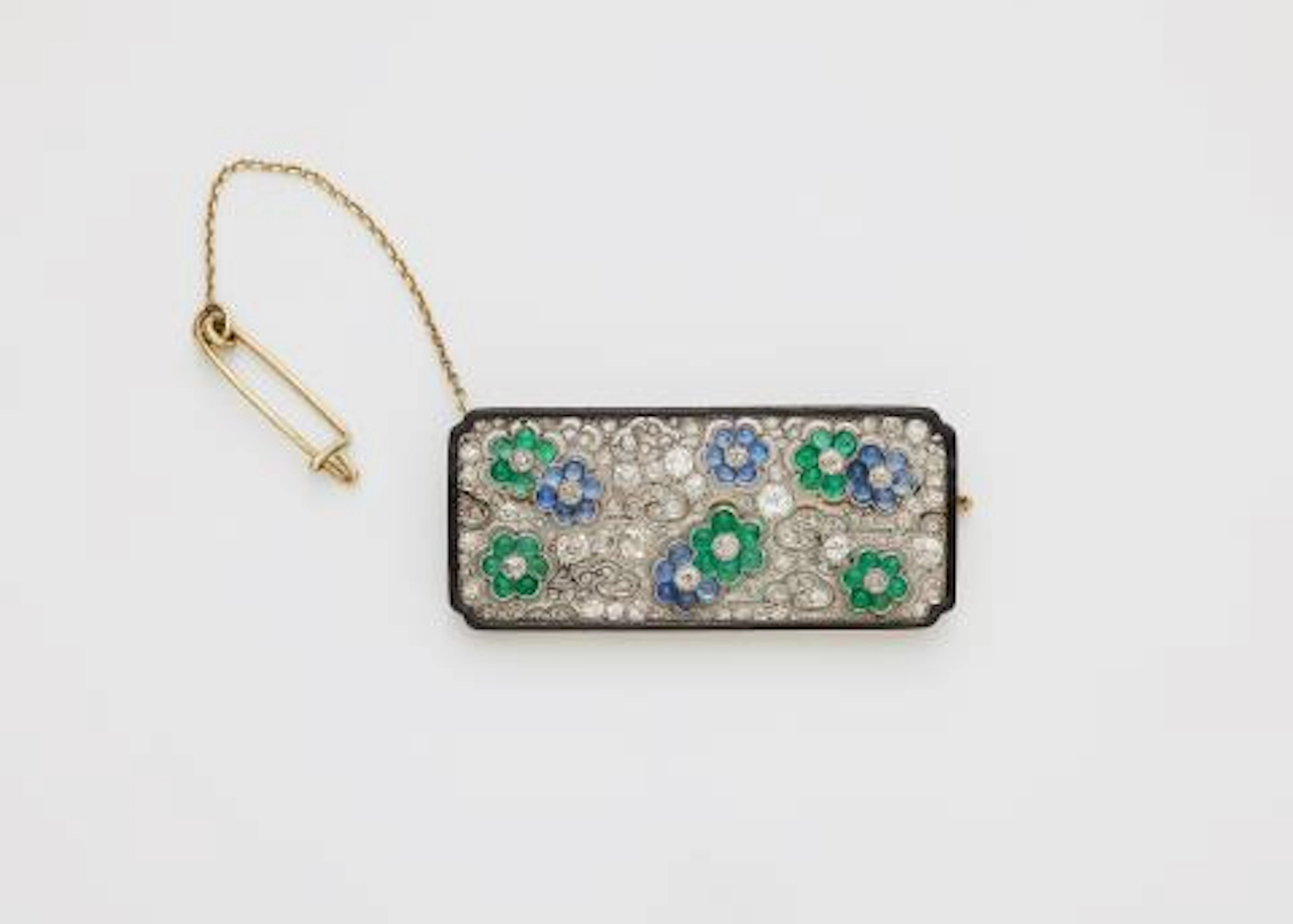 An Art Déco 14k gold platinum diamond sapphire and emerald Japanese