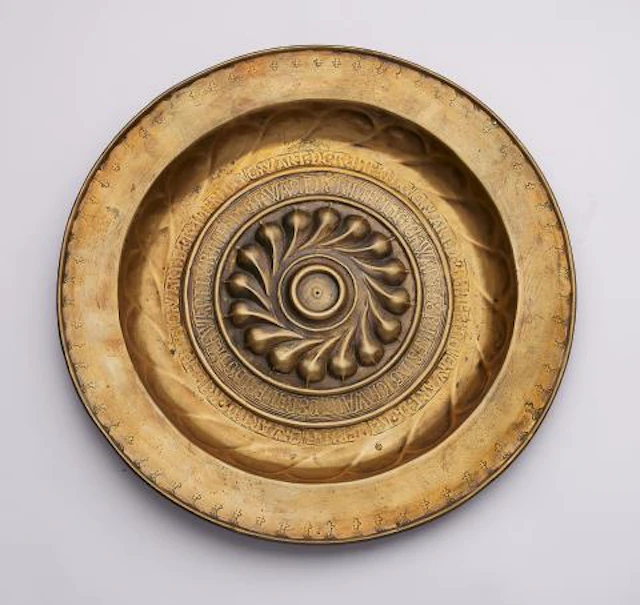 A brass 'Beckenschlägerschüssel' with a tracery rosette