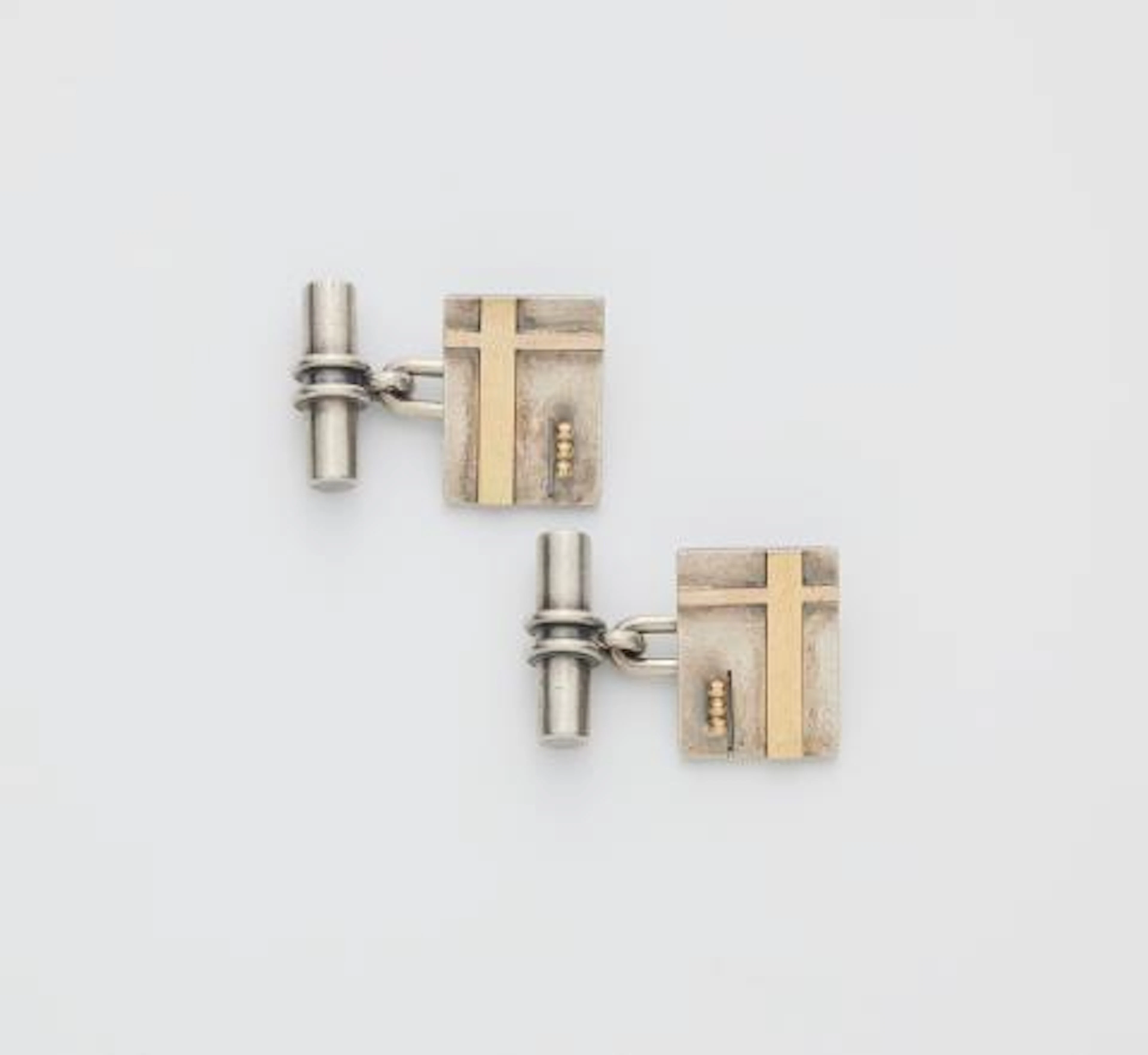 A pair of French silver and 18k gold Art Déco cufflinks.