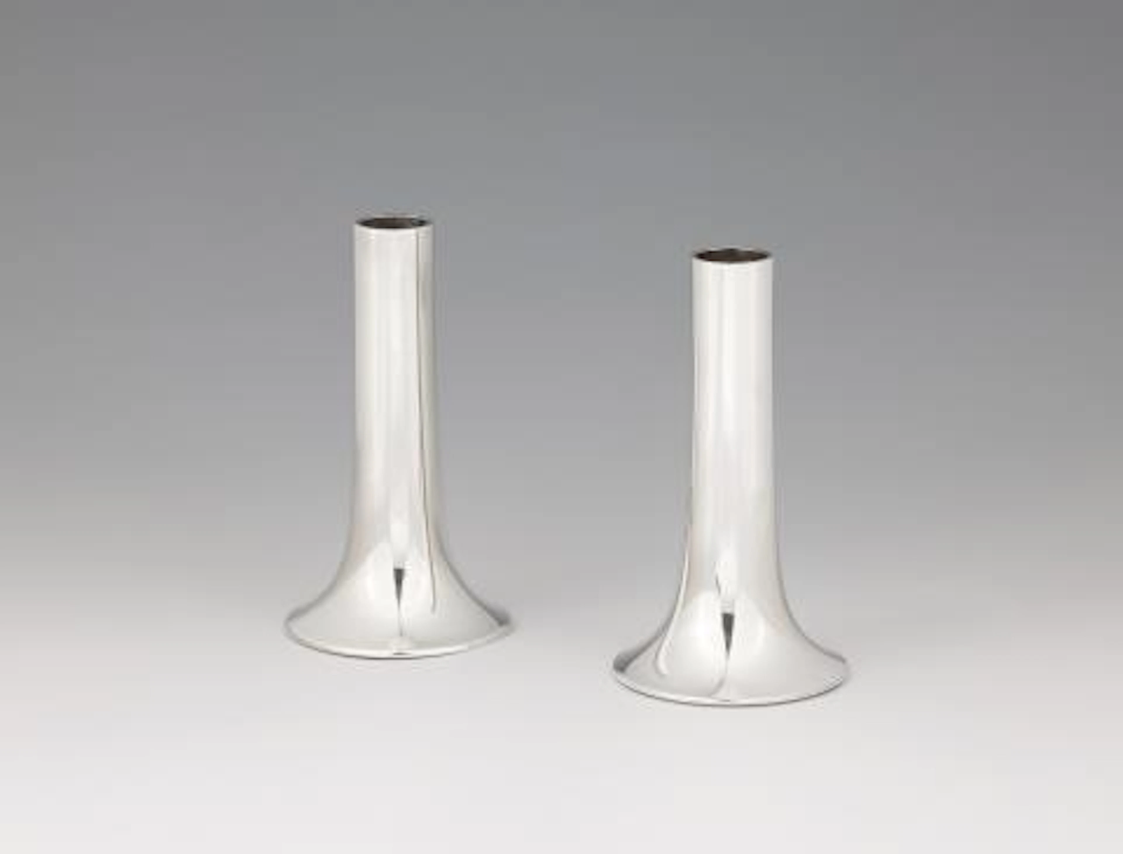 A pair of Georg Jensen silver candlesticks No. 1139