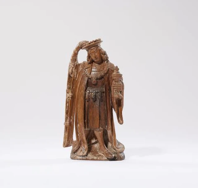 A carved oak figure of one of the Magi (possibly Melchior)