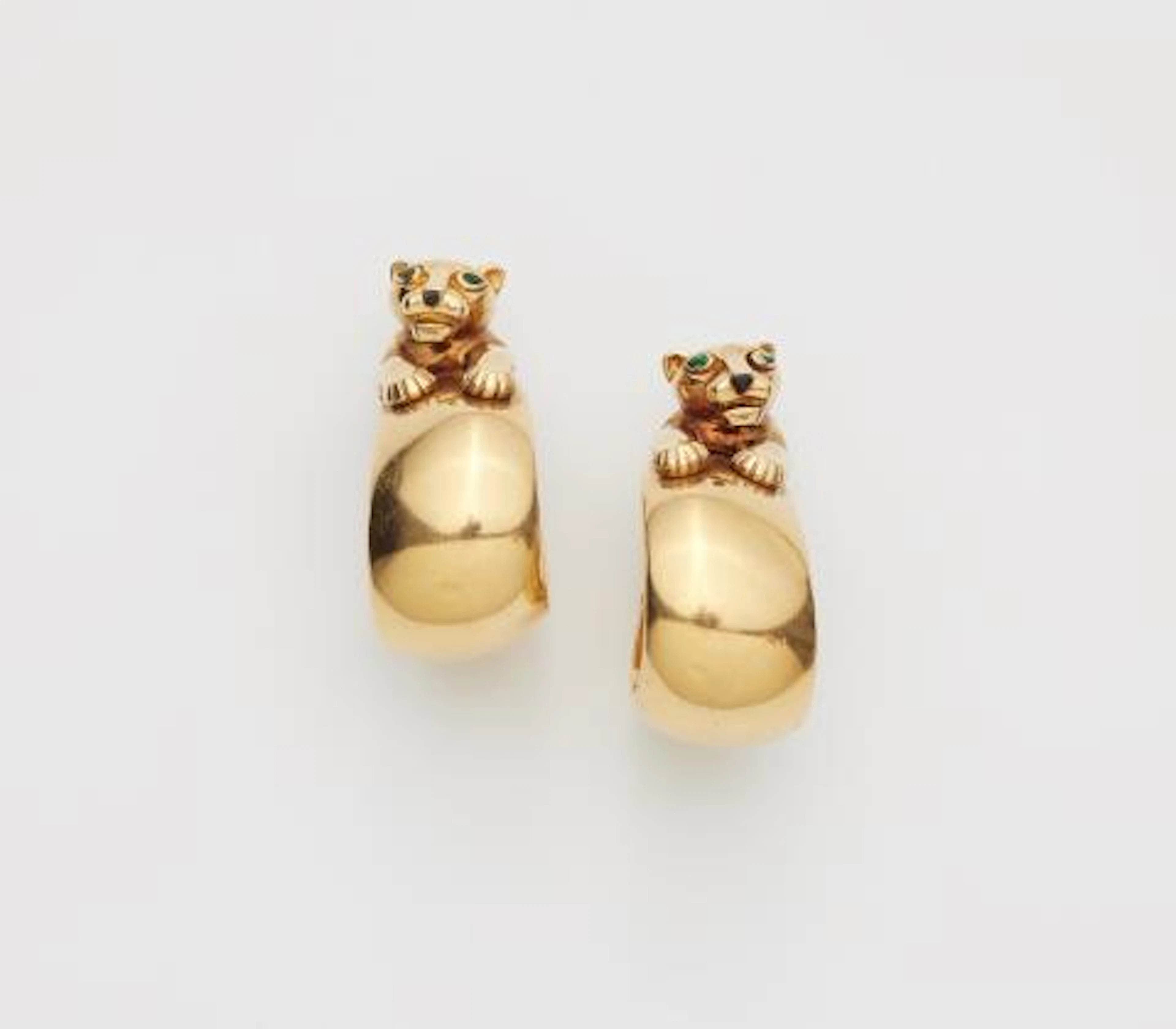 A pair of French 18k yellow gold onyx and emerald creole earrings
