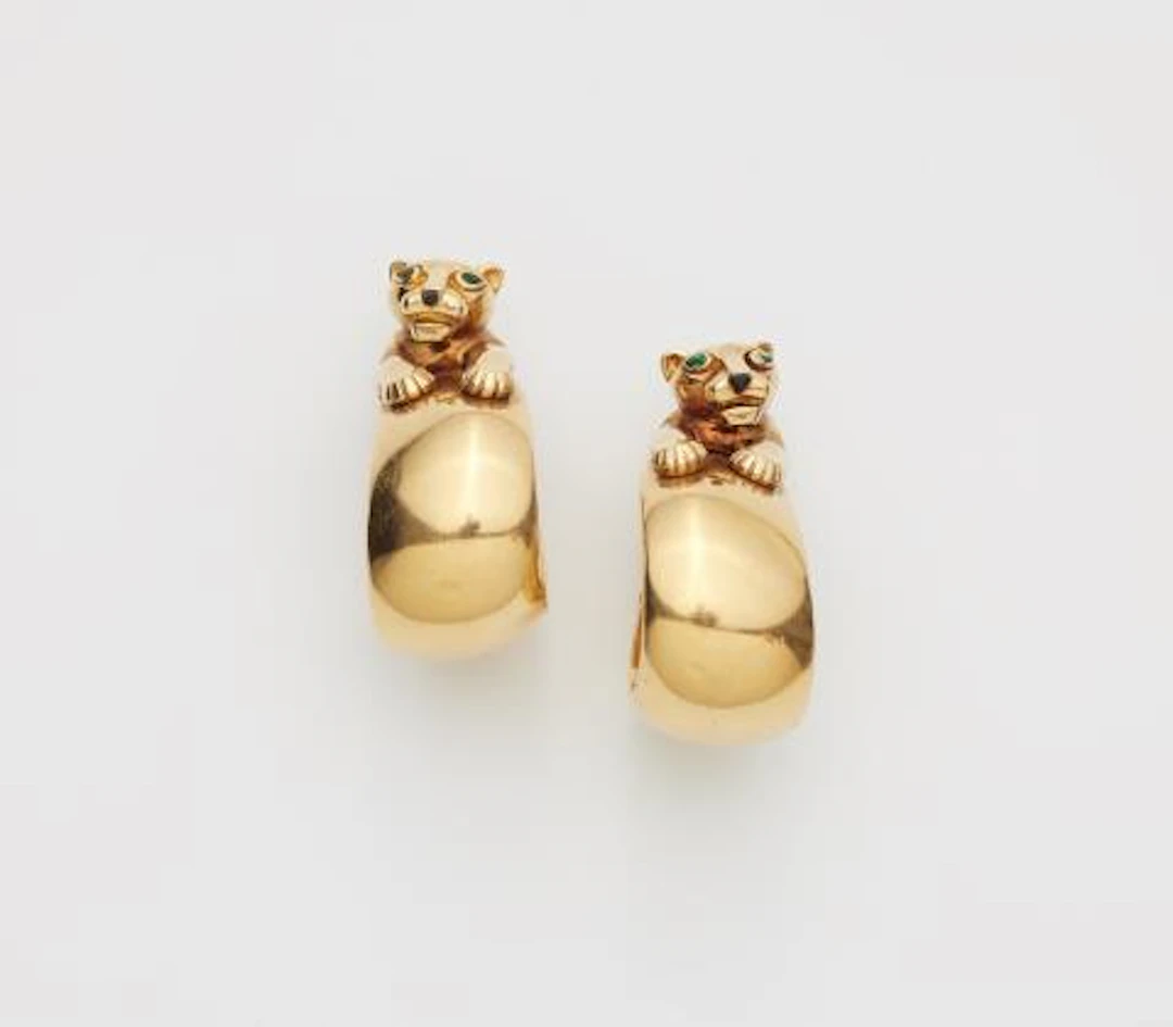 A pair of French 18k yellow gold onyx and emerald creole earrings