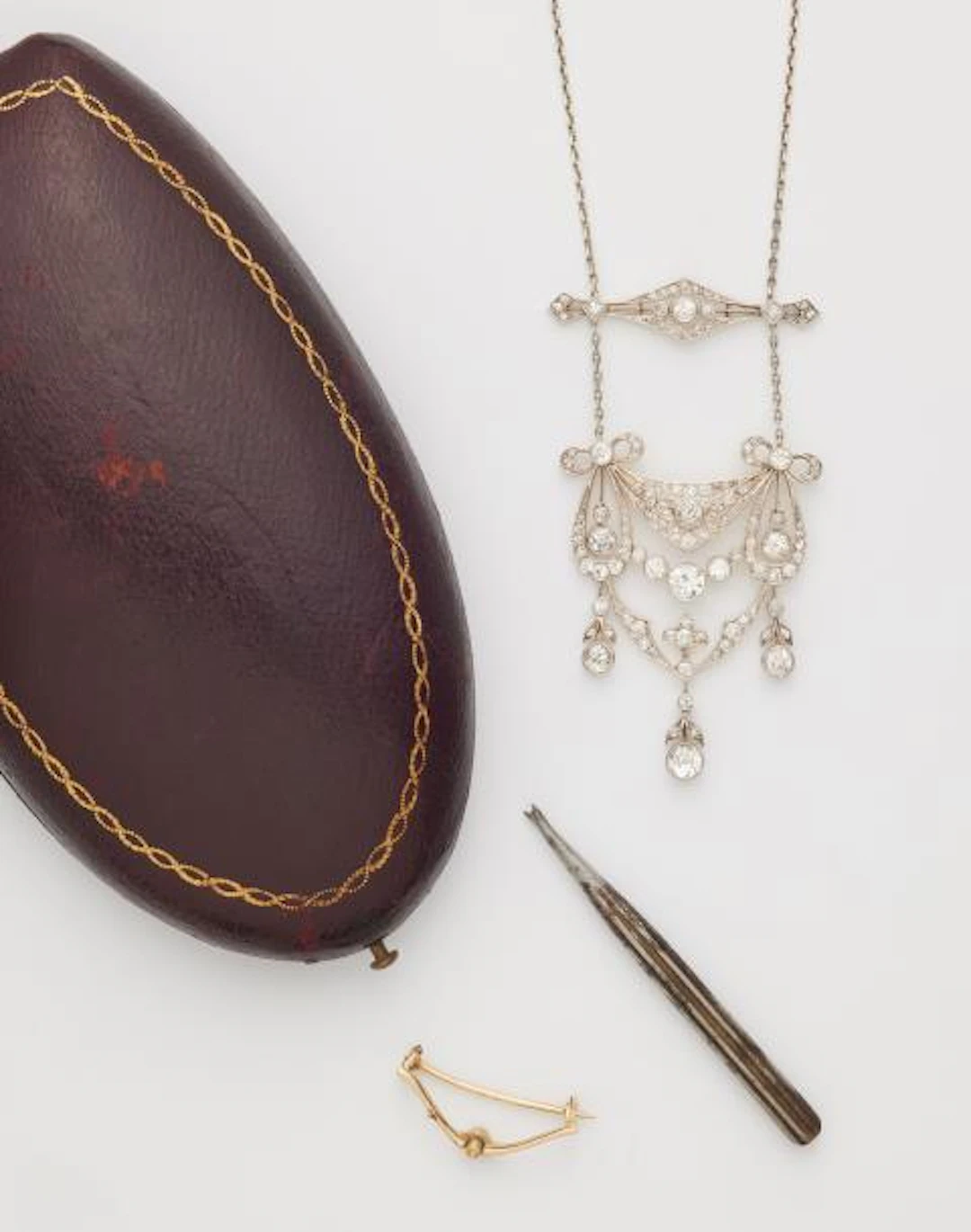 A 14k gold necklace with a 14k gold platinum and European old-cut