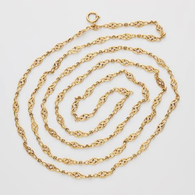 A long 14k gold Art Nouveau sautoir chain.