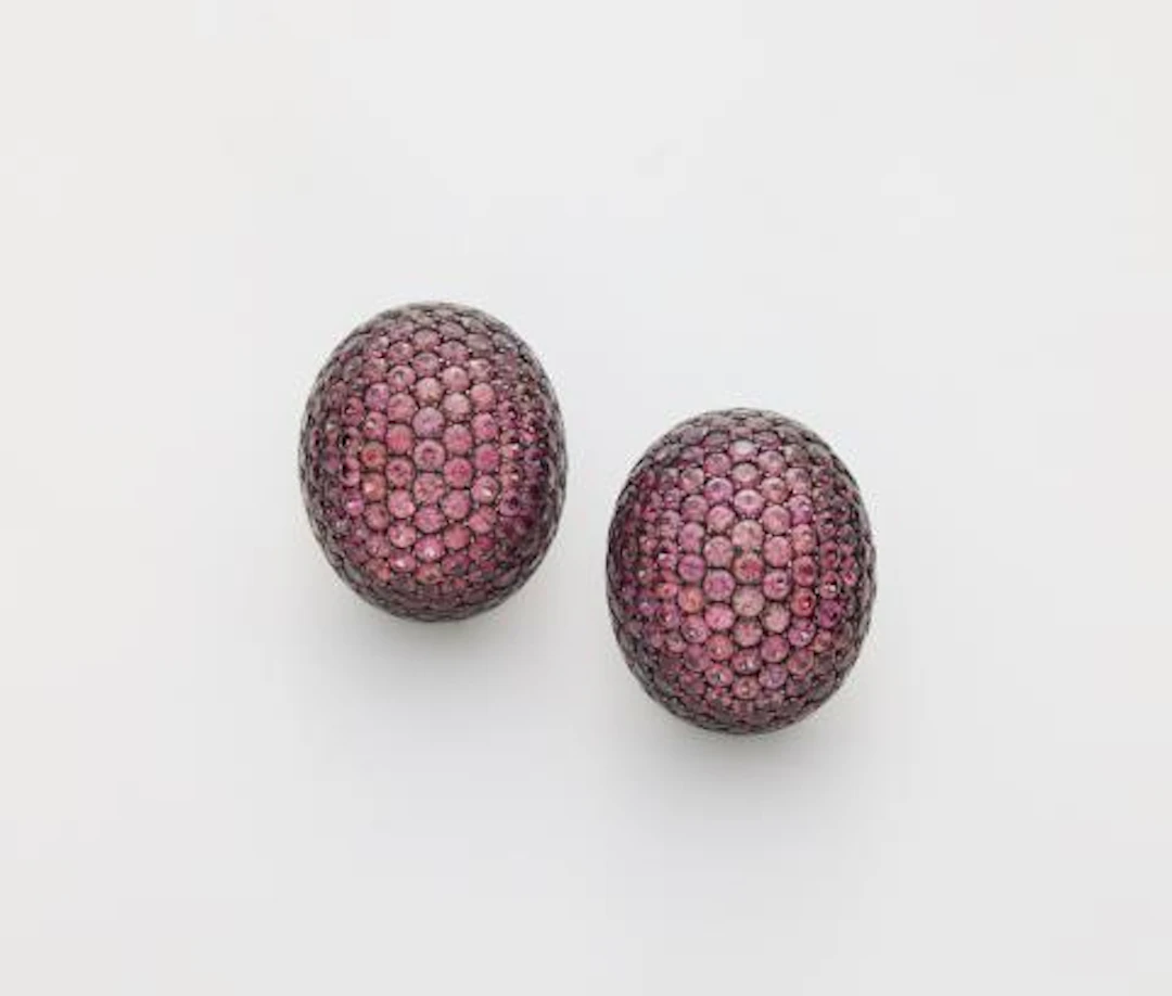 A pair of 18k gold and oxydised silver and Umba sapphire clip earrings