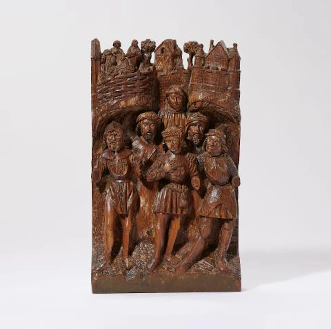 A carved oak relief with the betrayal of Judas