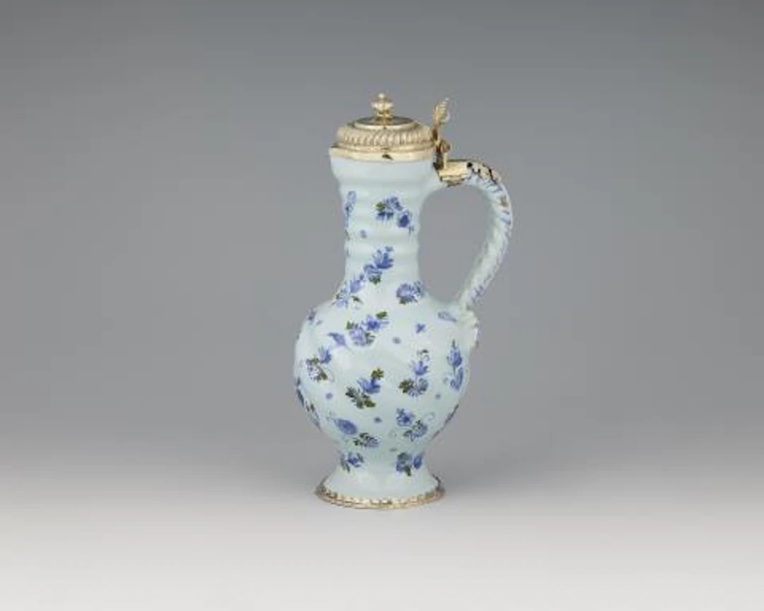 A Hanau faience jug with Augsburg silver gilt mounts