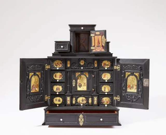 A writing cabinet painted with scenes from the New Testament