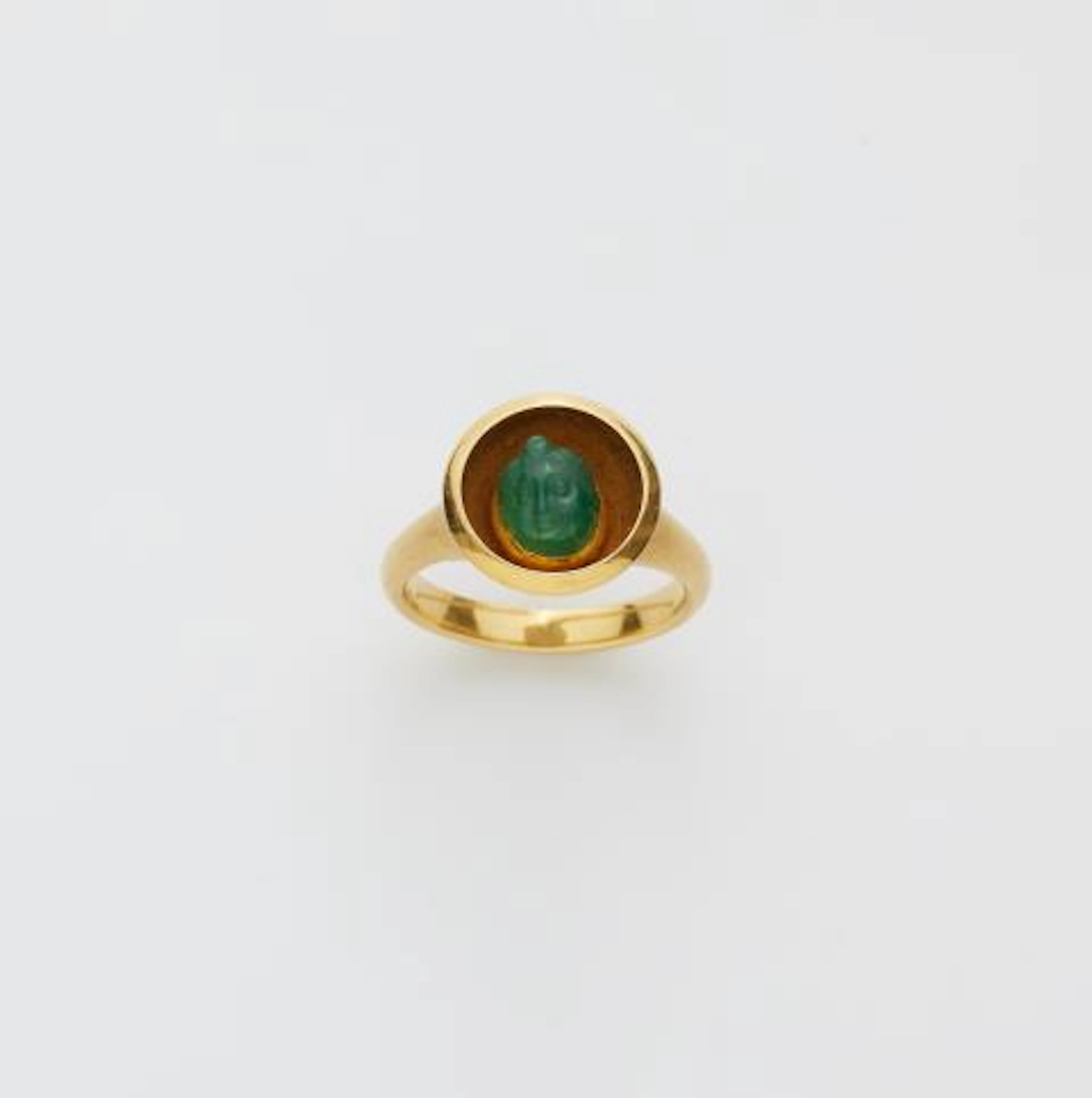 A German 18k yellow gold ring with a Roman Imperial chrome chalcedony