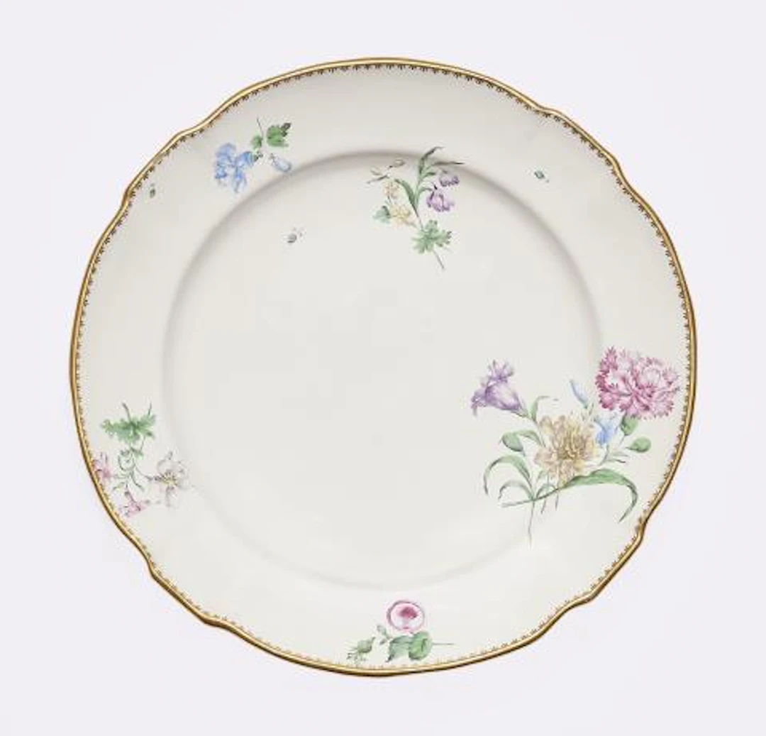 A Strasbourg faience plate with floral decor