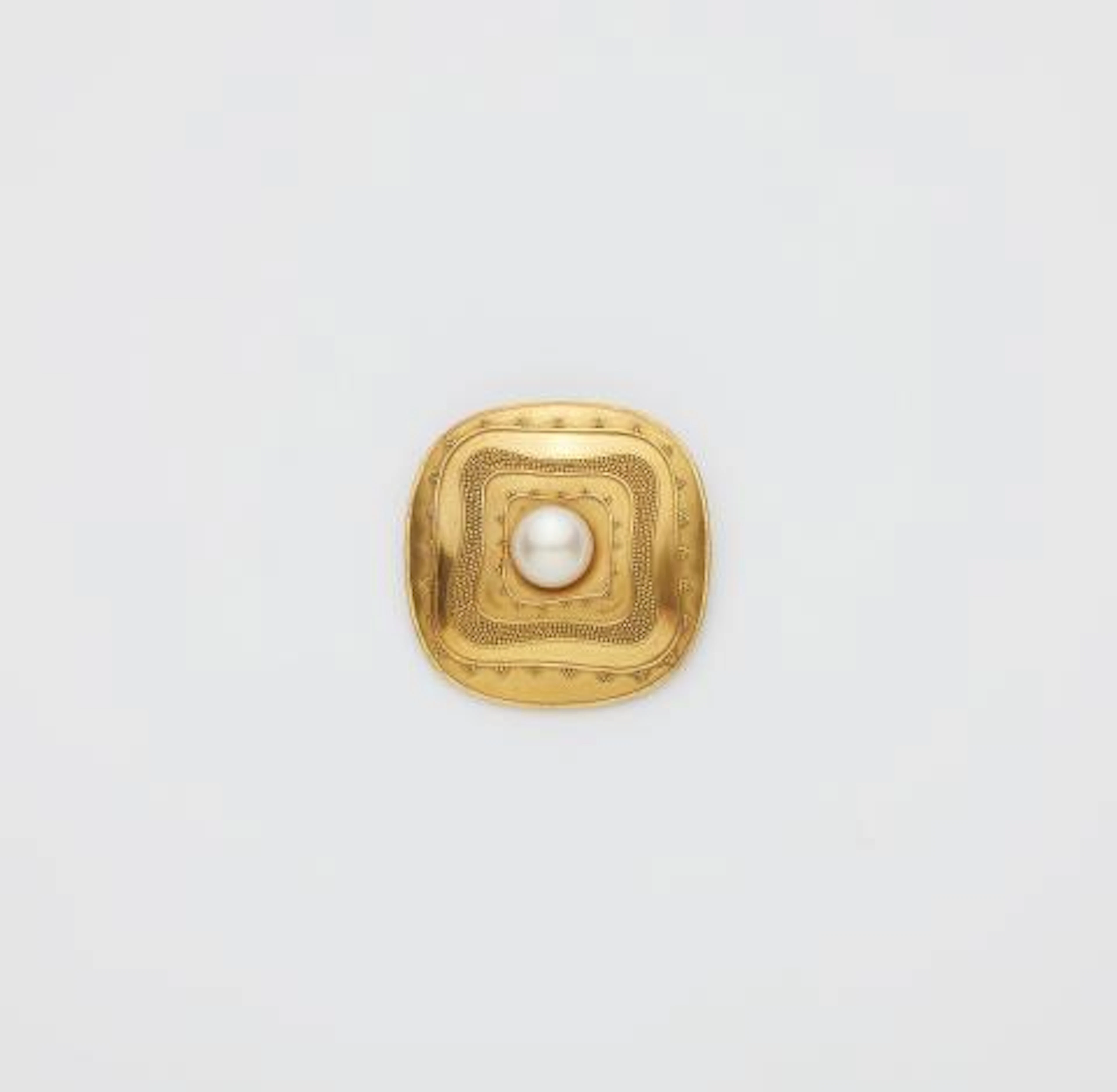 A German 18k gold granulation and cultured pearl buckle brooch.