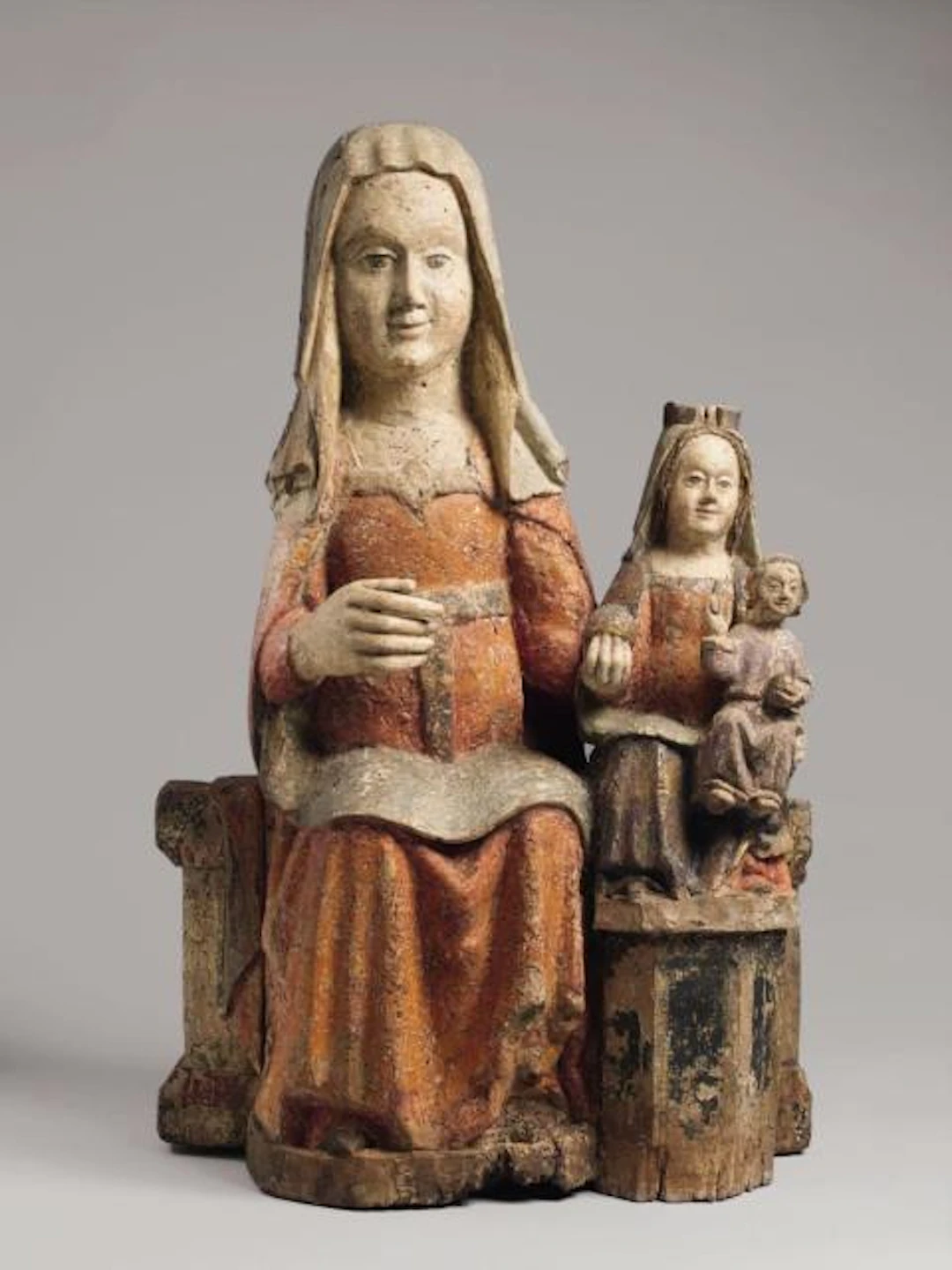 A carved group of Saint Anne with the Virgin and the Child Jesus