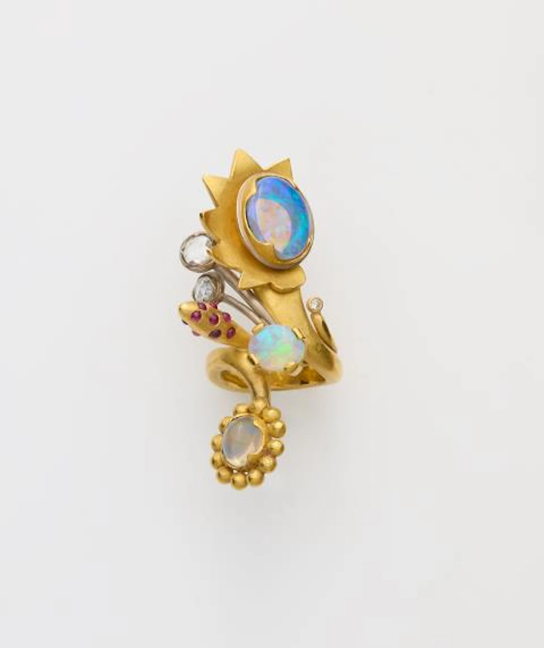 A German 18k yellow gold platinum opal diamond and ruby sculptural