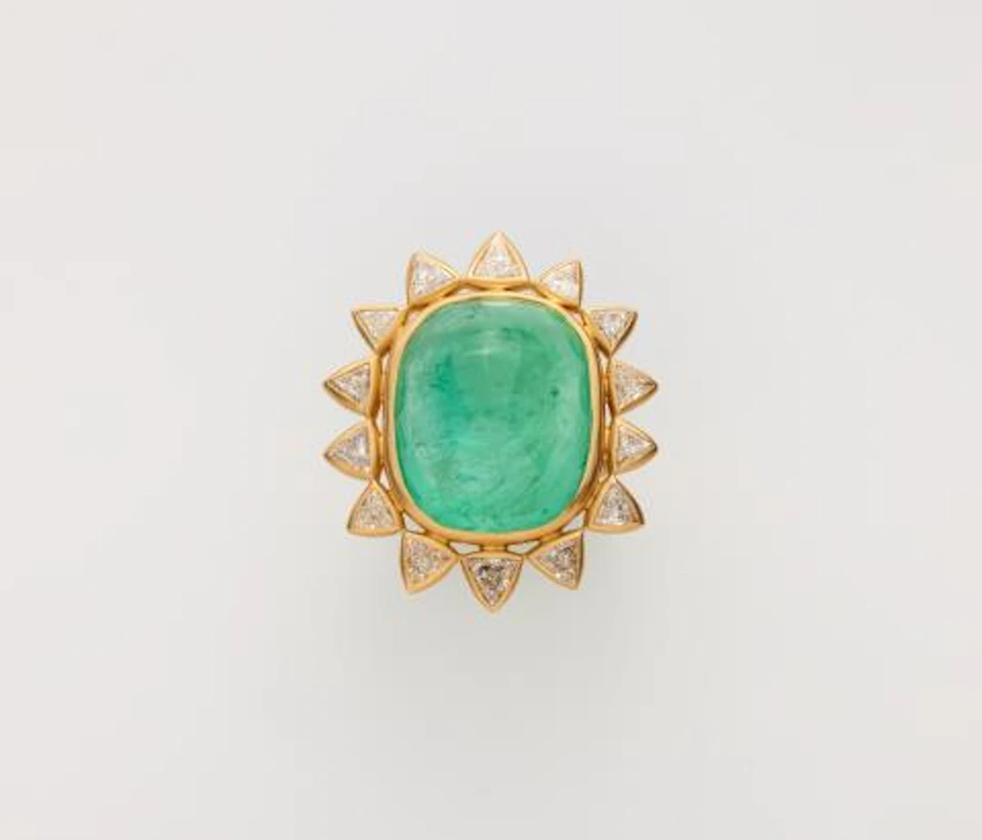 A frosted 18k yellow gold diamond and c. 29.80 ct sugarloaf-cut Russian