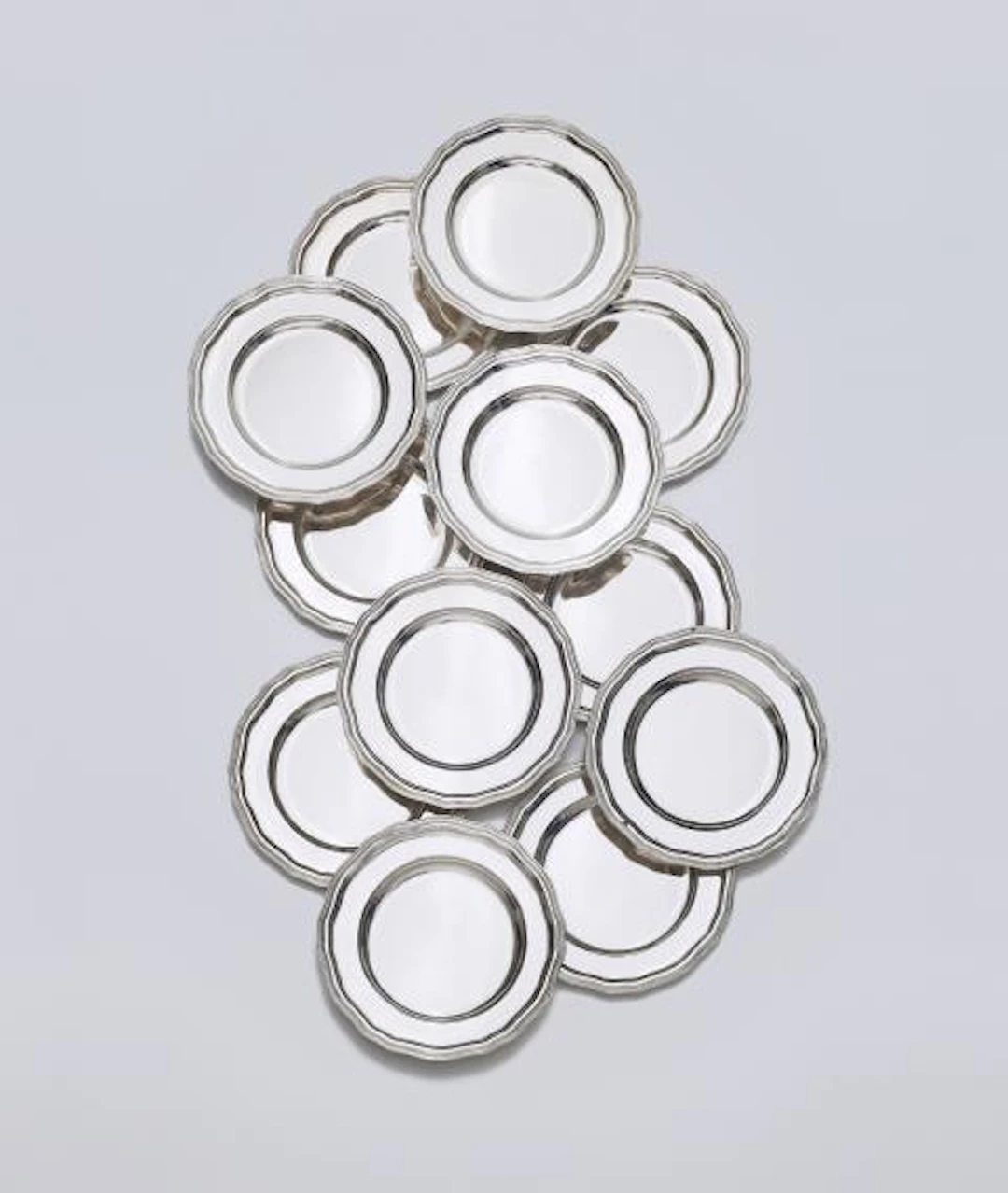 Twelve silver plates from the Dresden Court