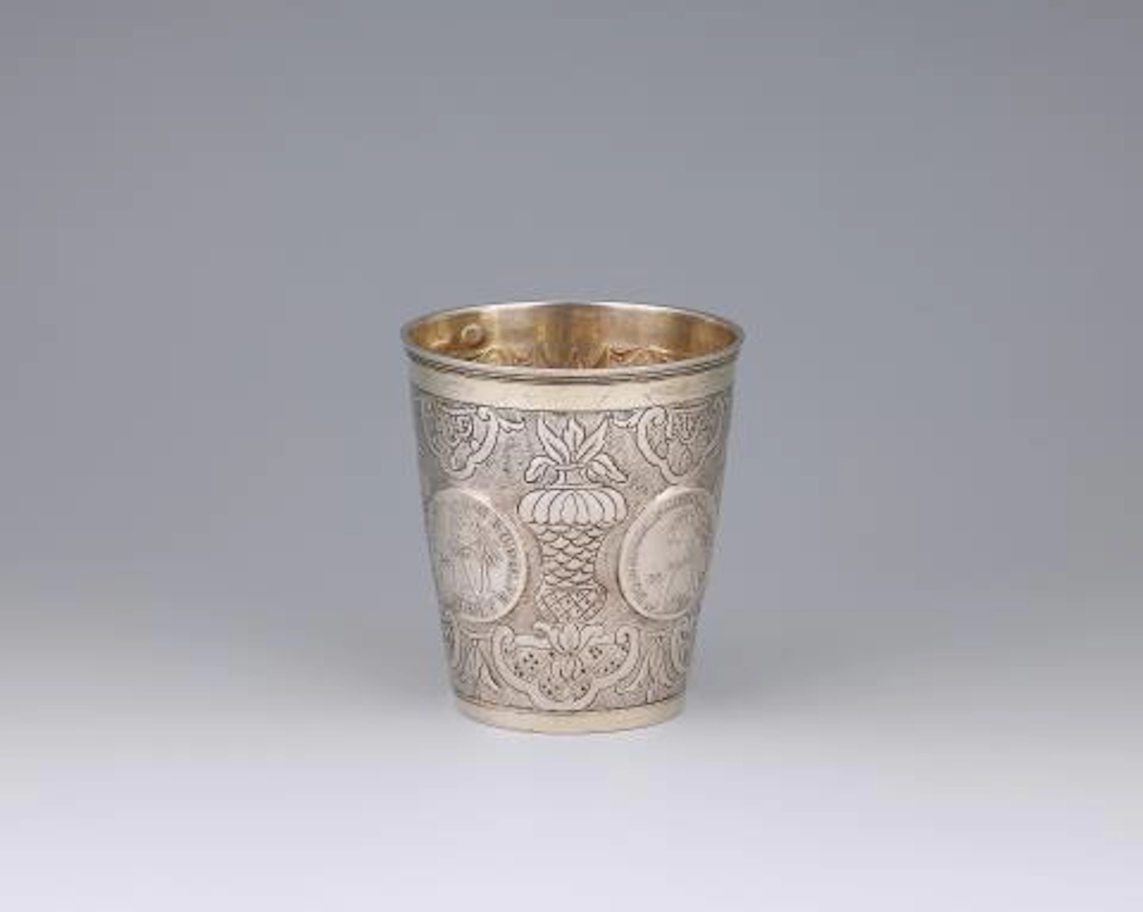 A Berlin parcel-gilt silver coin beaker