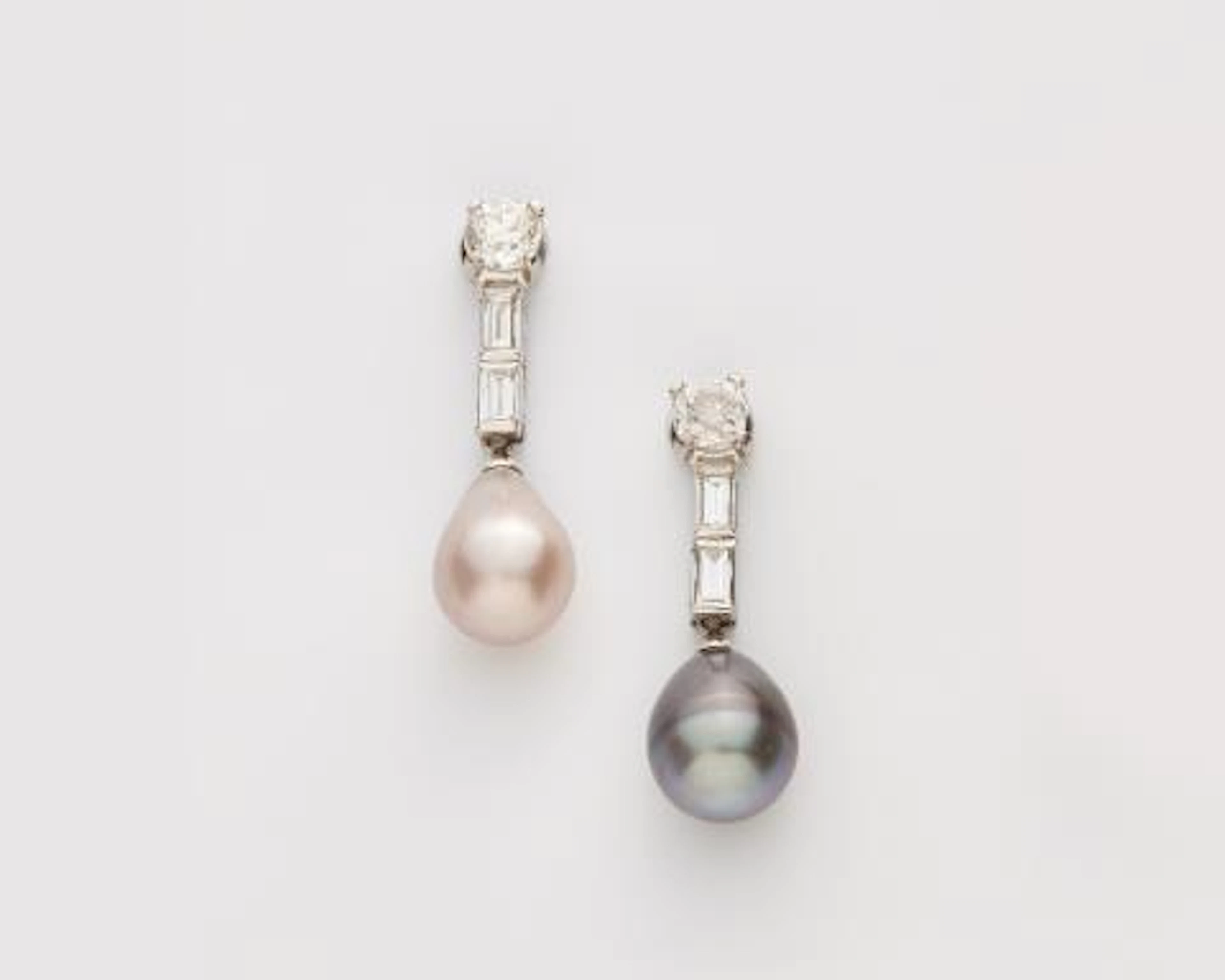 A pair of platinum diamond and Oriental coloured pearl drop earrings.
