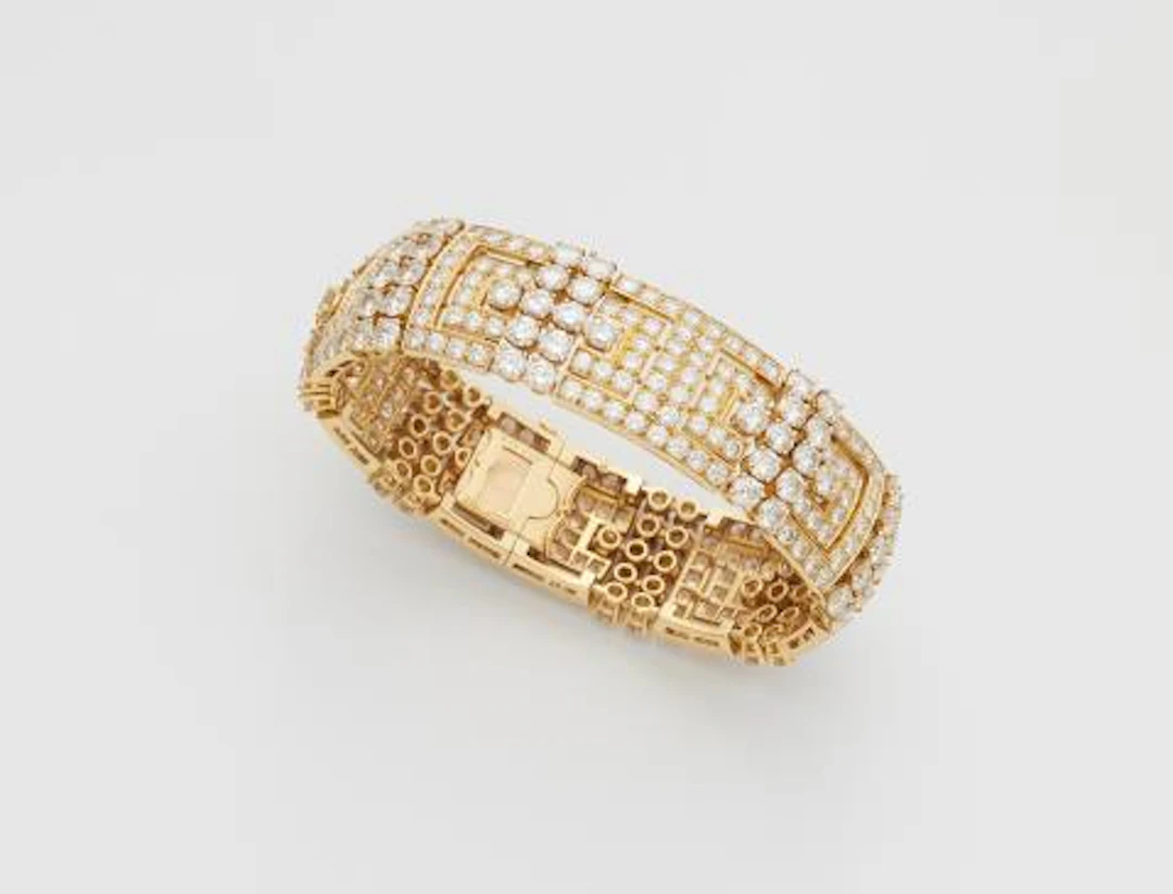 A French 18k yellow gold and diamond cuff bracelet.