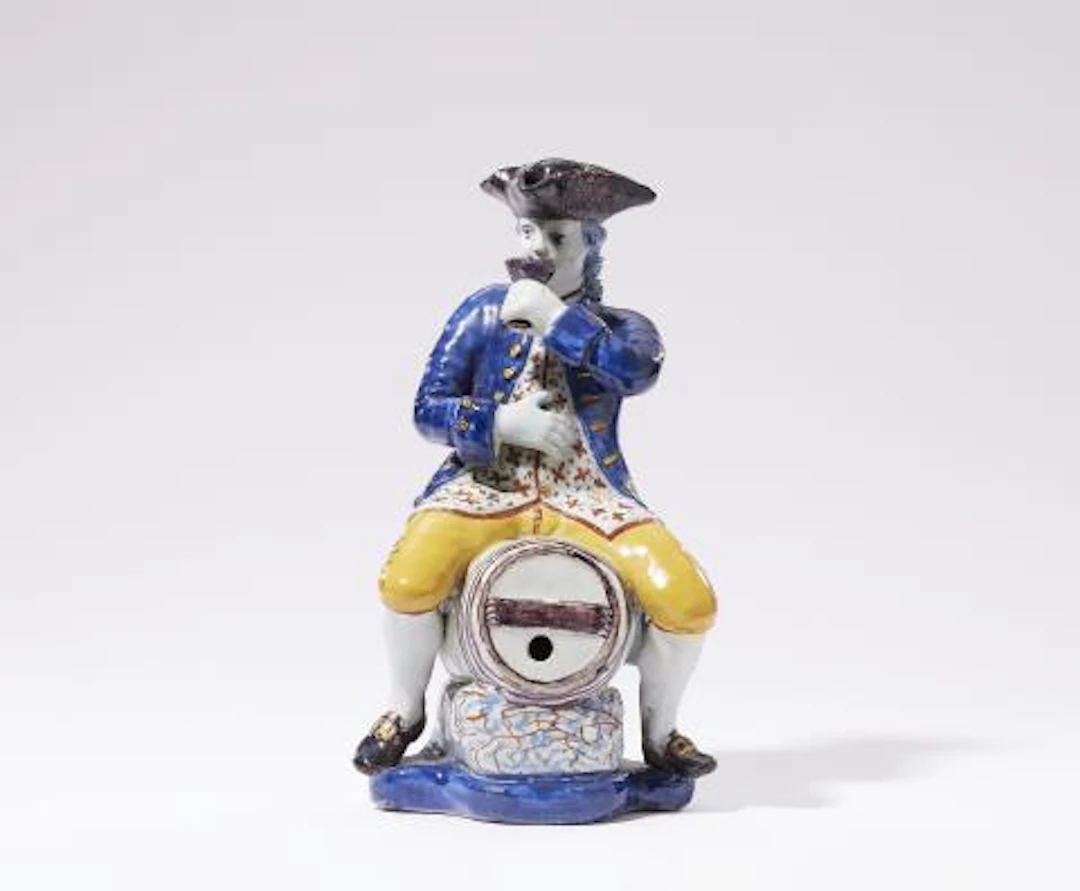 A Dutch Delft faience "Man op een ton"