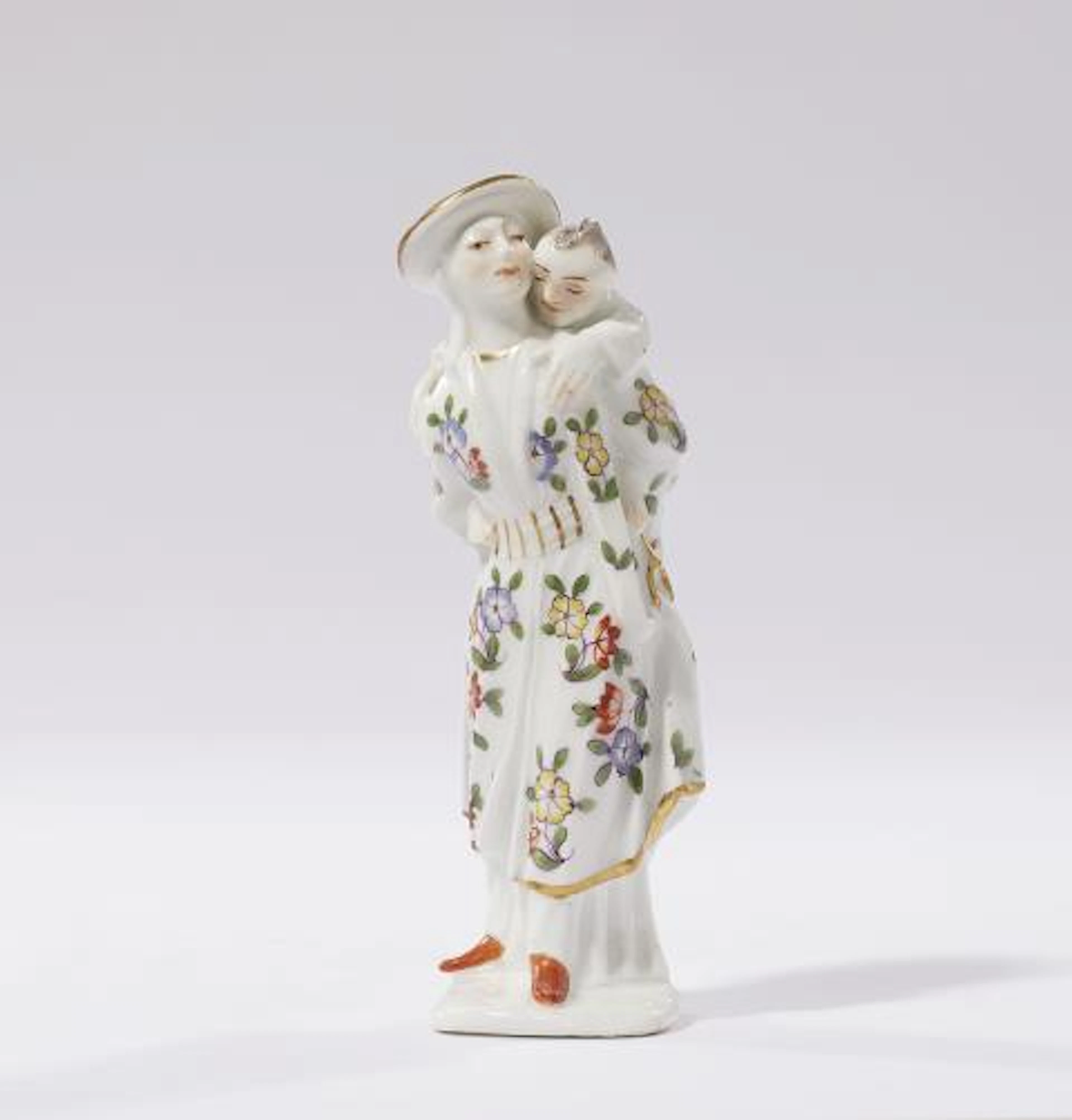 A rare Meissen porcelain figure of a Japanese woman carrying a child