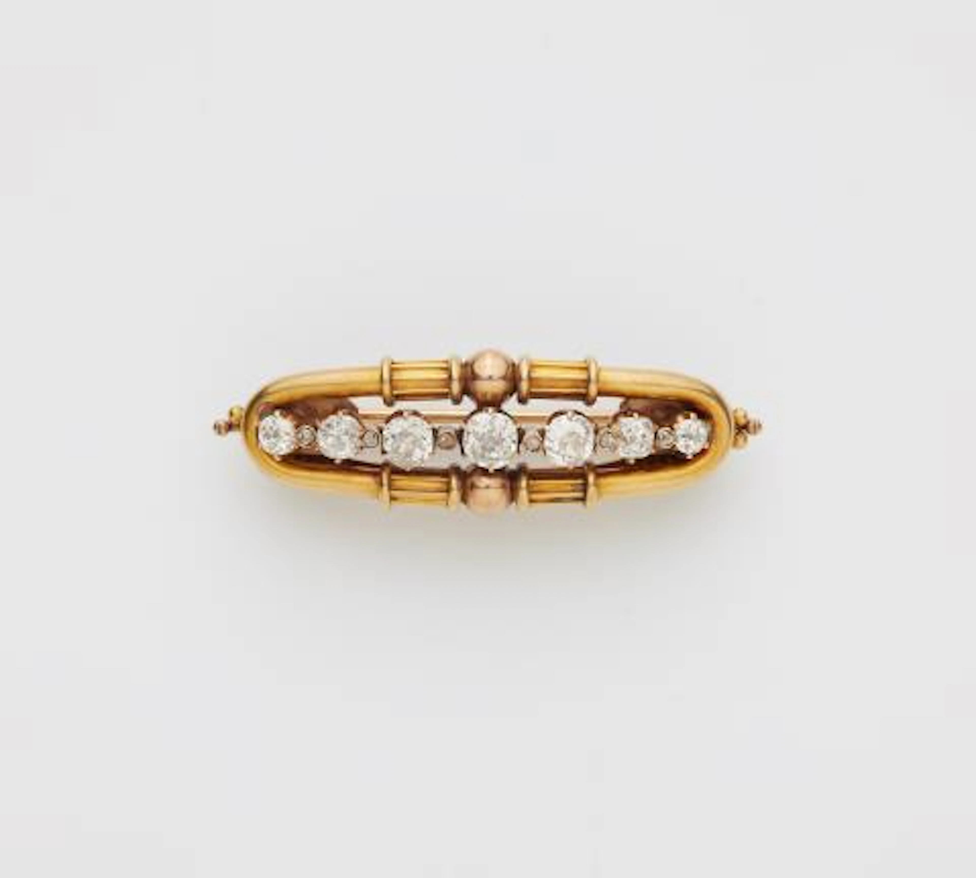 A convertible Russian 12k yellow gold and diamond bar brooch. The