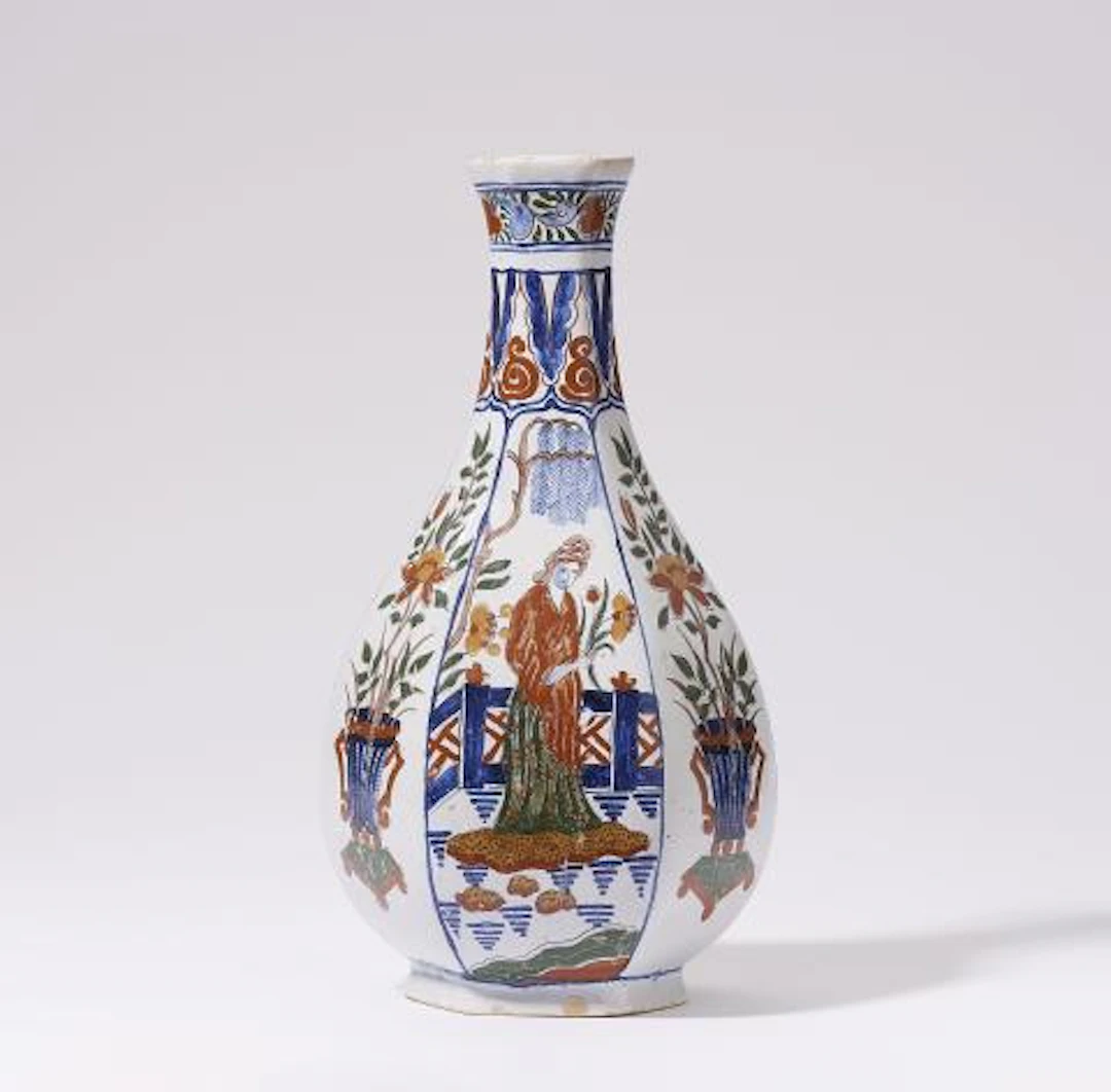 A large Delft style faience vase