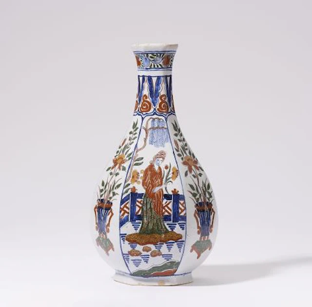 A large Delft style faience vase