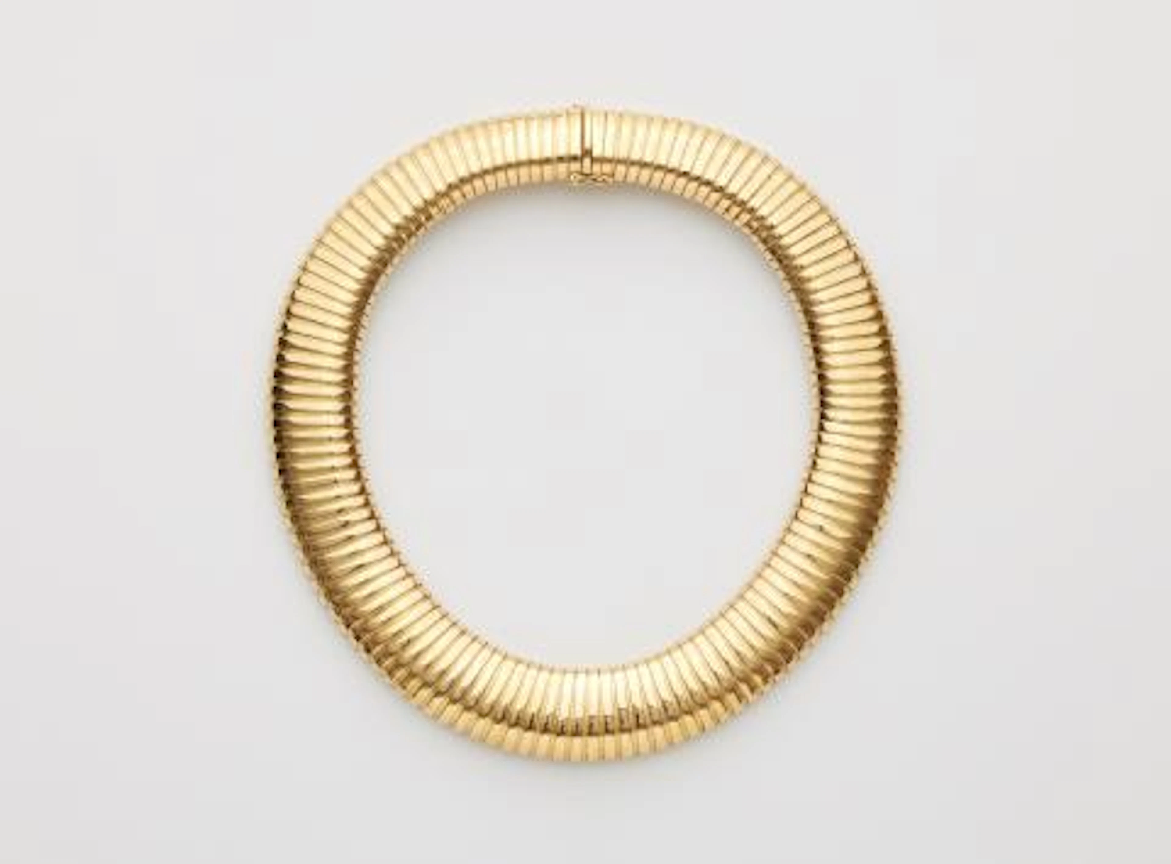 An Italian 18k yellow gold tubogaz necklace.