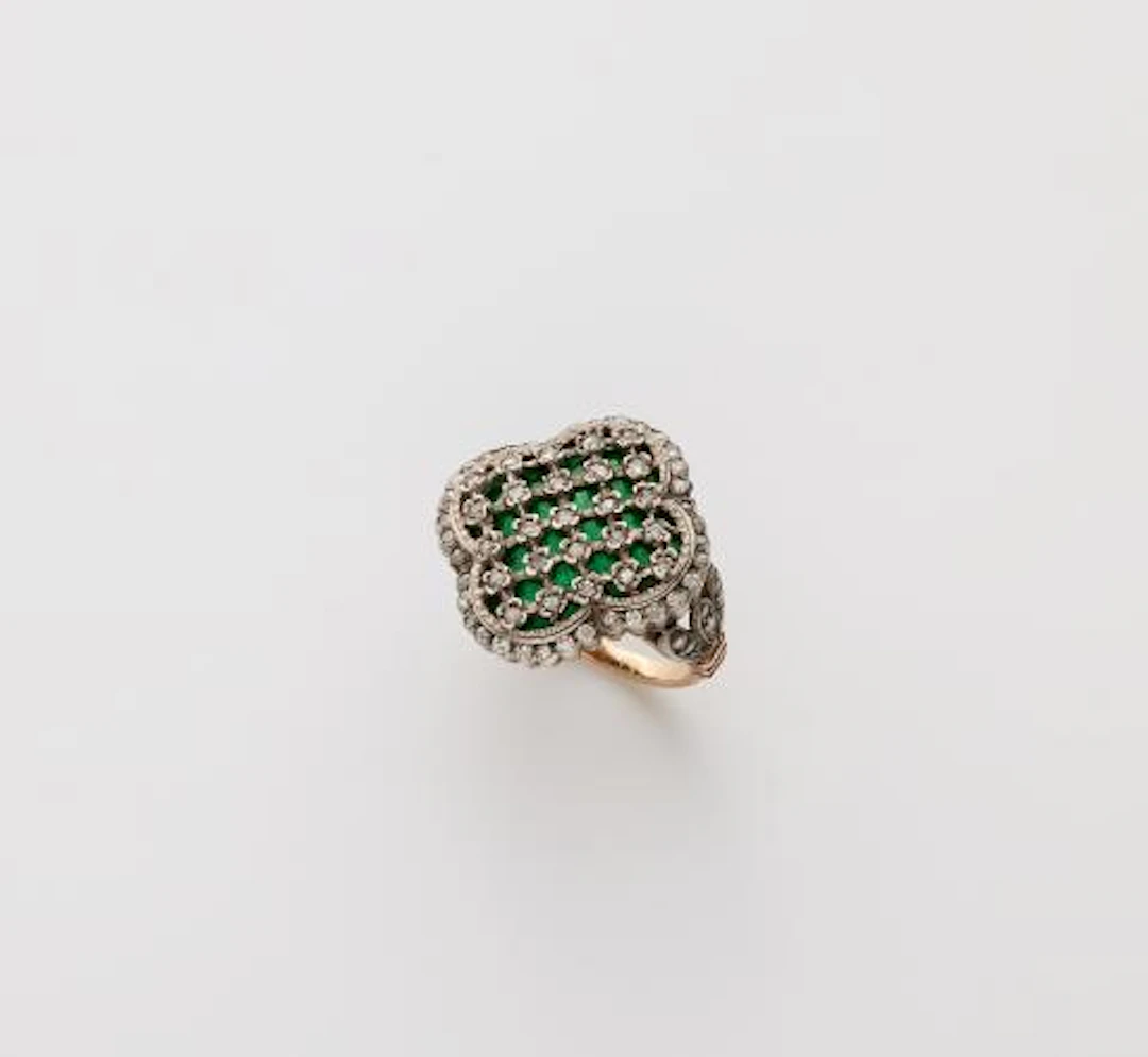 A silver 18k gold and translucent enamel Rococo Style ring.