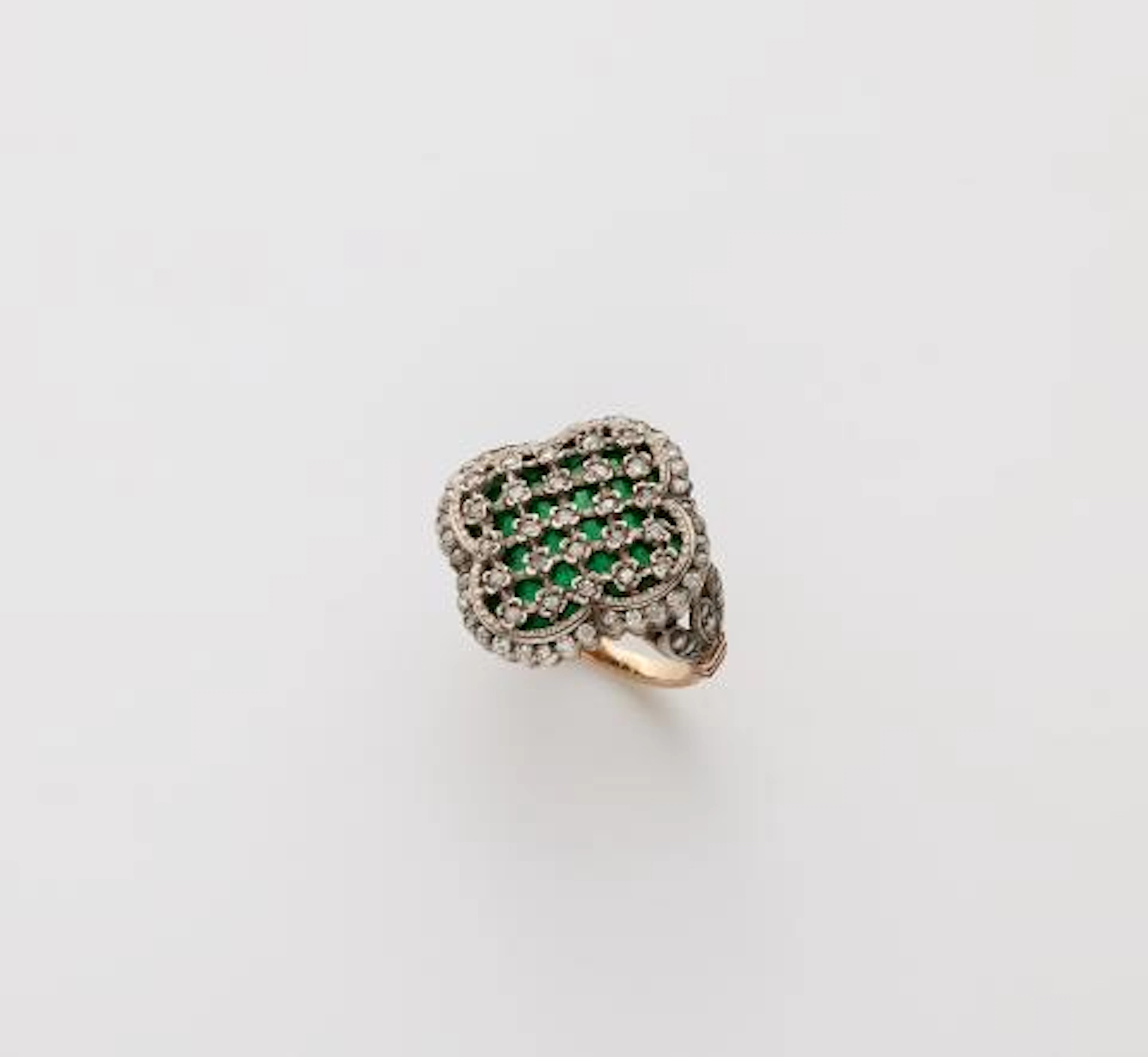A silver 18k gold and translucent enamel Rococo Style ring.
